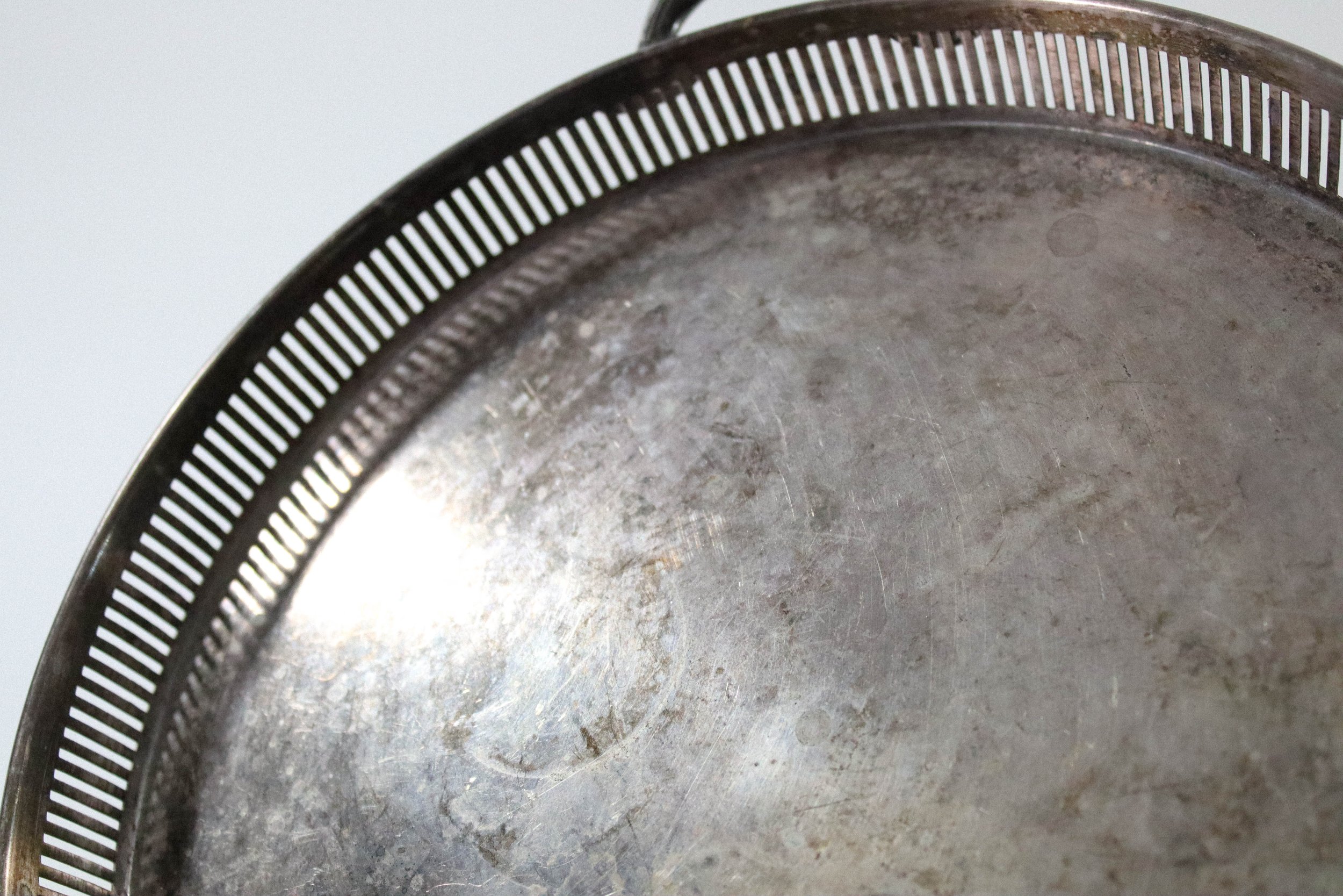 Vintage Reed & Barton round silver tray with handles.