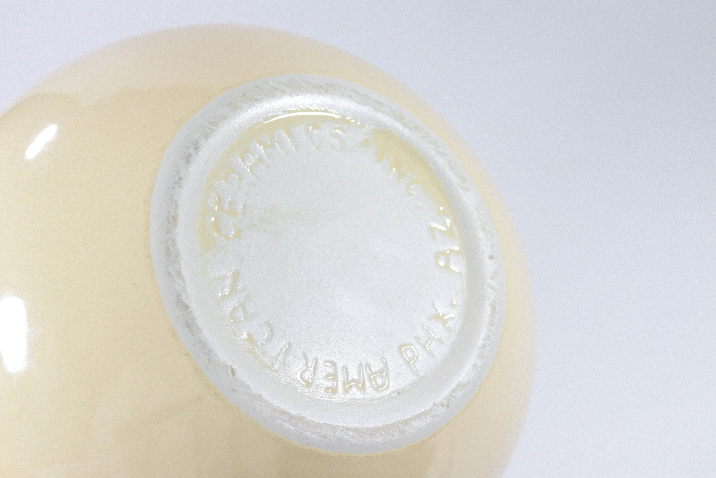Large and hefty pale yellow ceramic bowl by American Ceramics Inc in Phoenix, Arizona