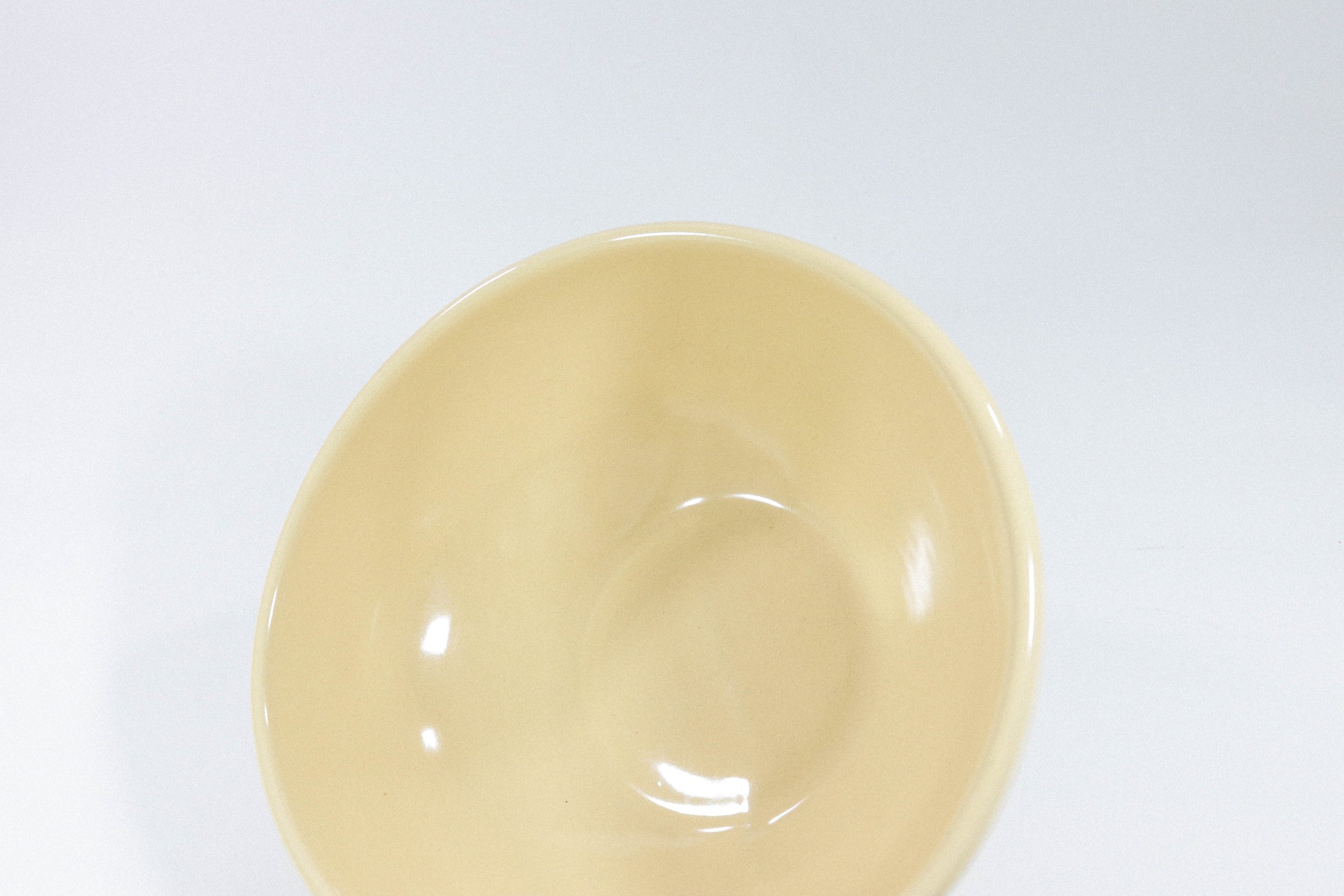 Large and hefty pale yellow ceramic bowl by American Ceramics Inc in Phoenix, Arizona