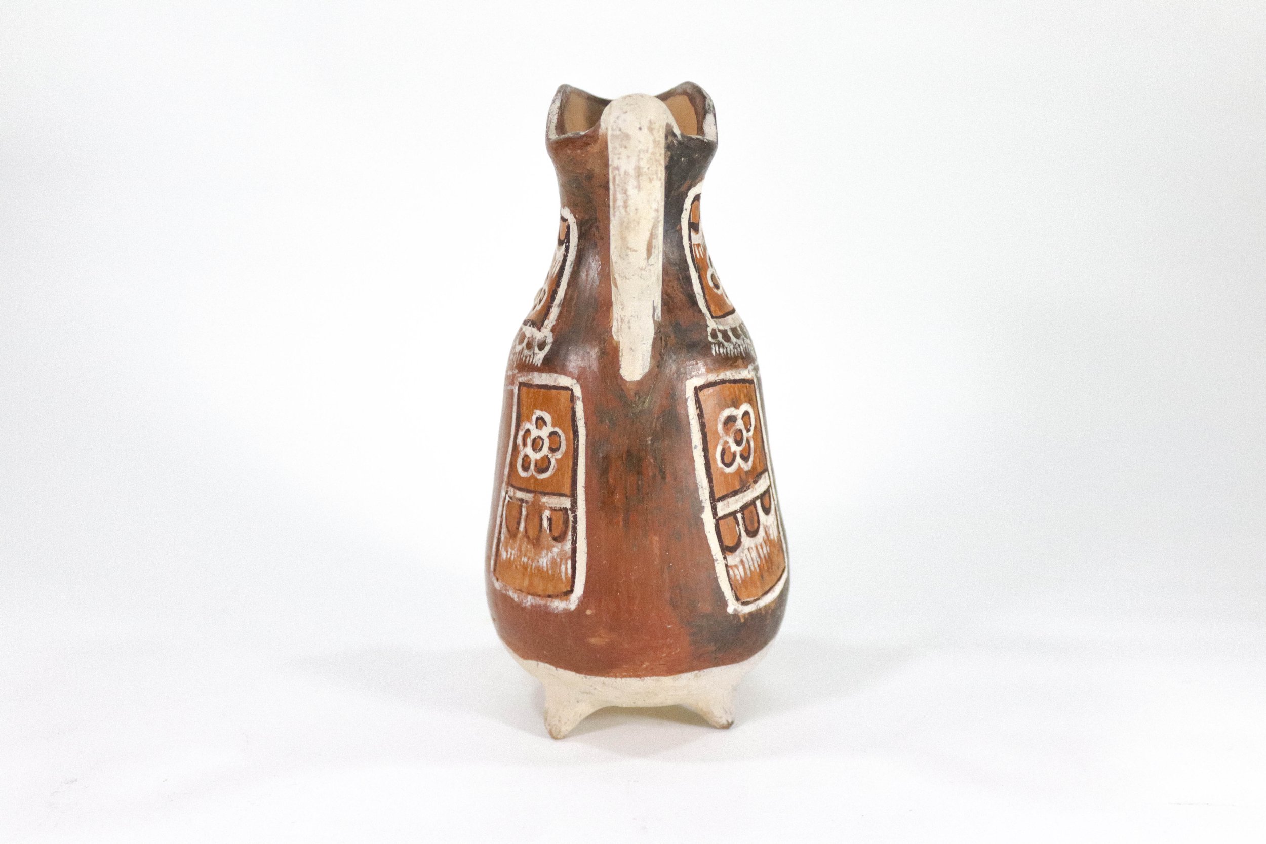 Vintage, handmade Peruvian ceramic pitcher—a one-of-a-kind find!