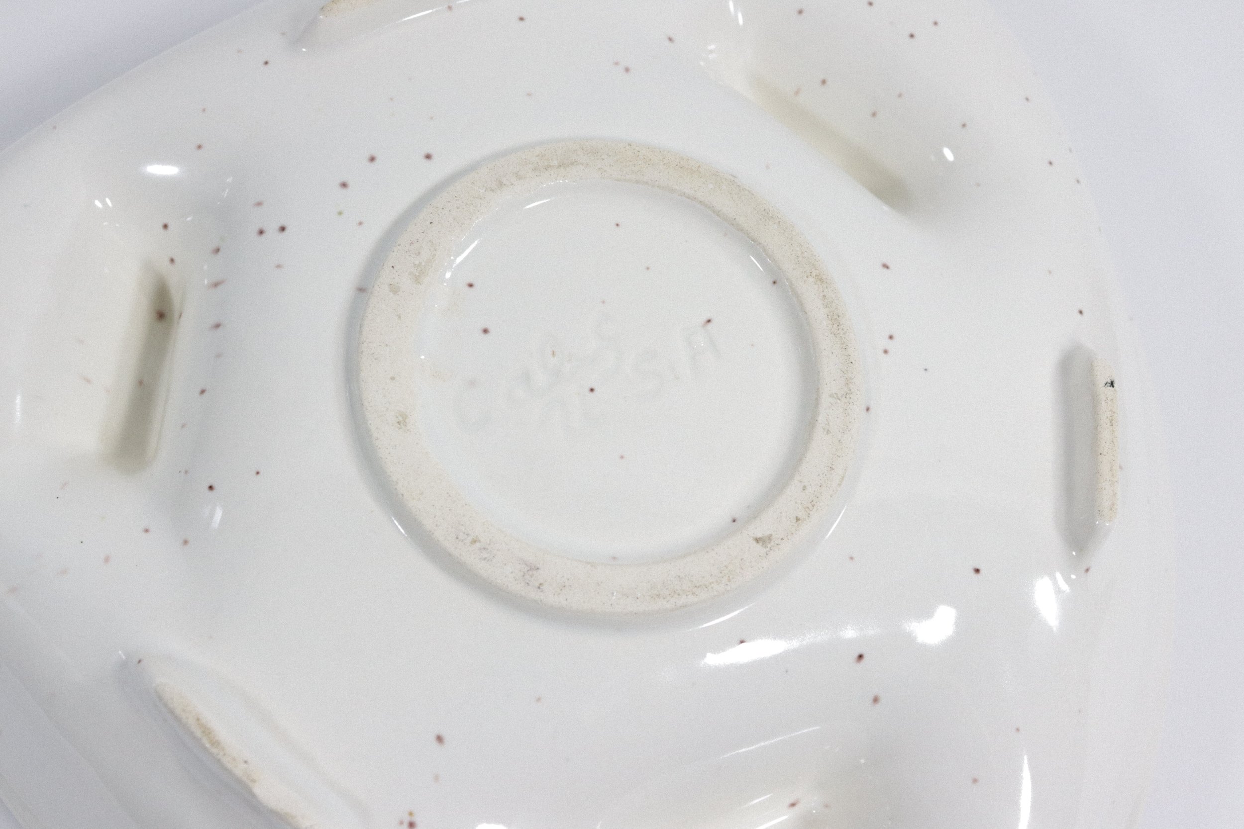Vintage speckled triangle pottery ashtray. Made in California, USA.