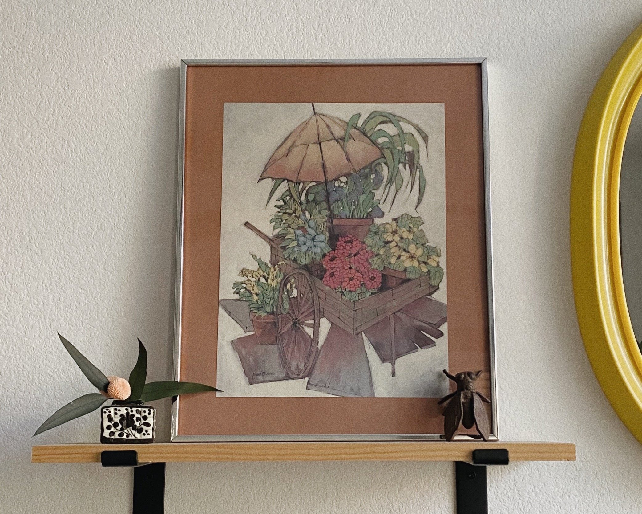Lawrence Reiter Plant Cart lithograph art in silver frame.