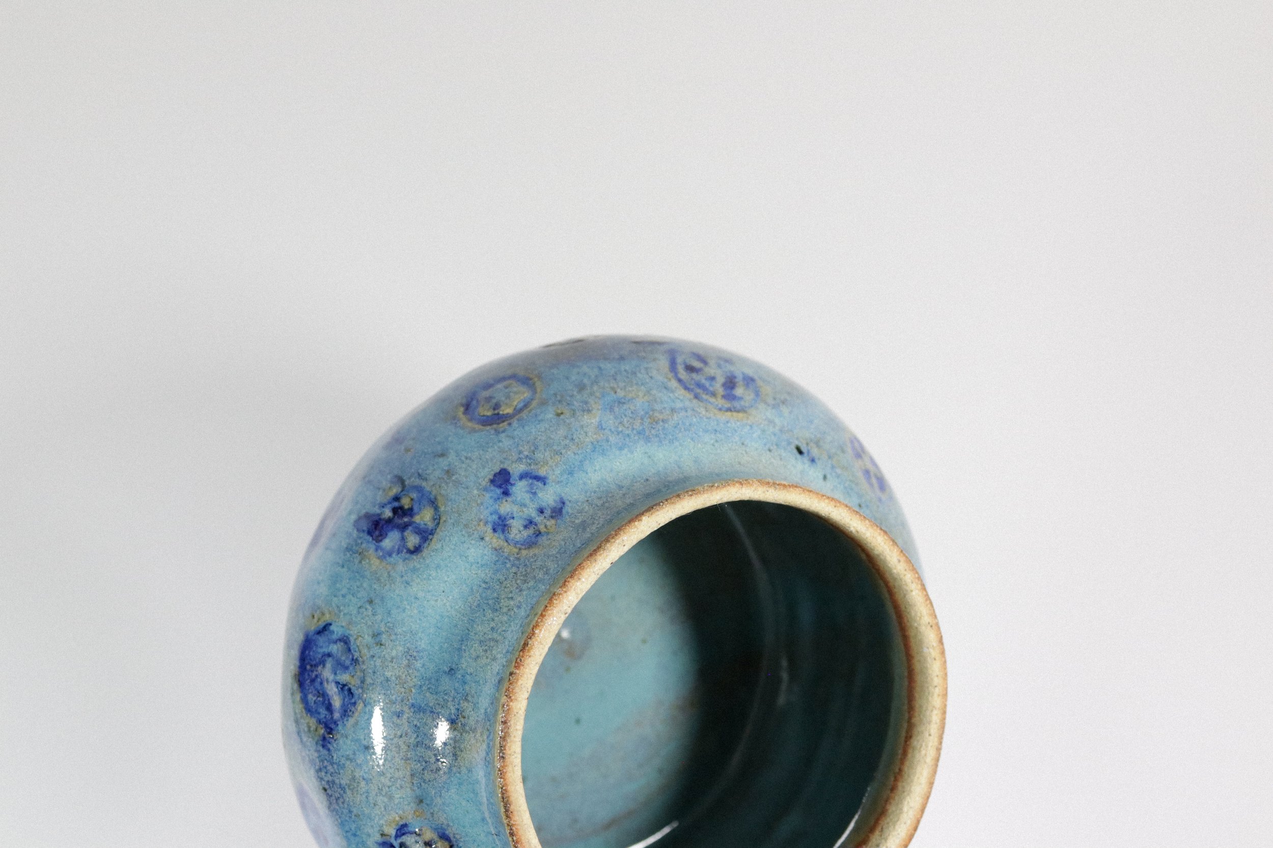 Handmade blue ceramic pottery jar with lid.