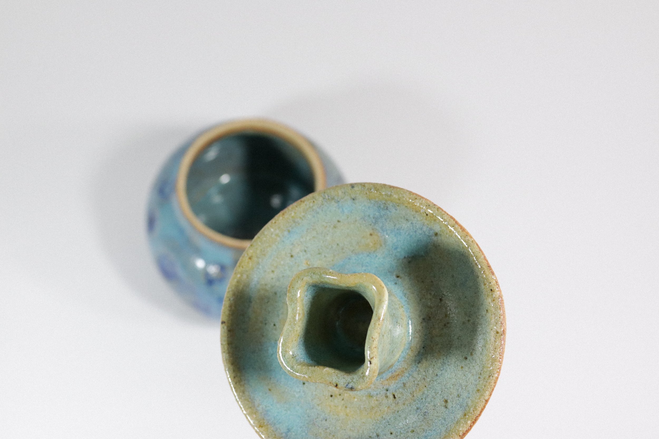 Handmade blue ceramic pottery jar with lid.