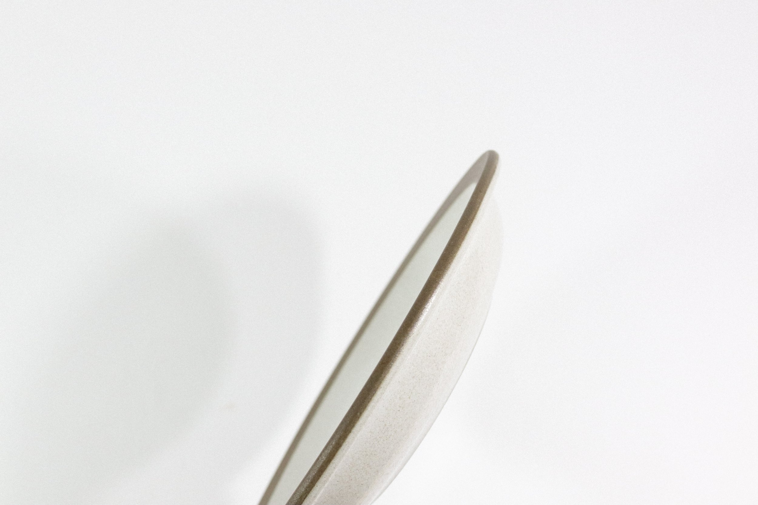 Set (4) of vintage 1960s Heath Ceramics Rim Line bread and butter plates.