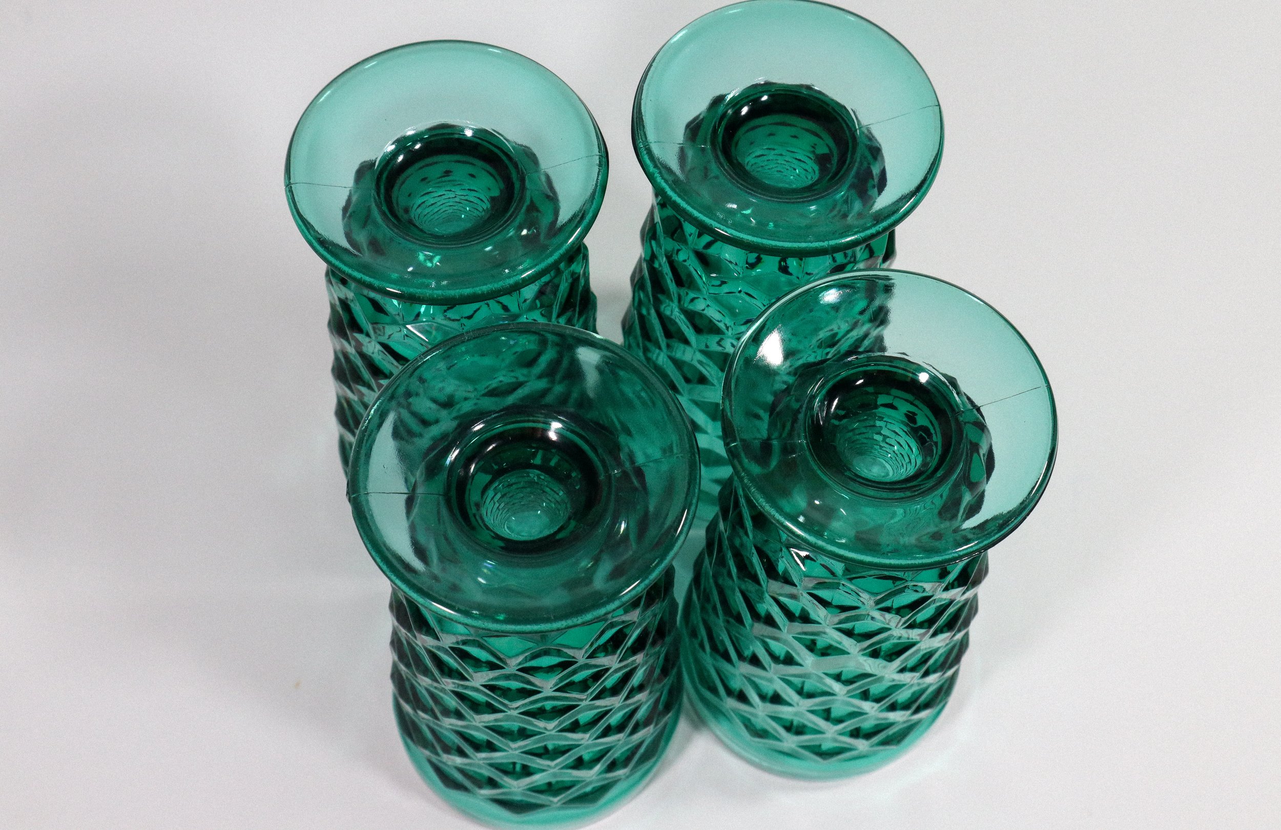 Set (4) of vintage, Indiana Whitehall cubist tall footed glasses in teal, a highly coveted colorway for this style of glassware.