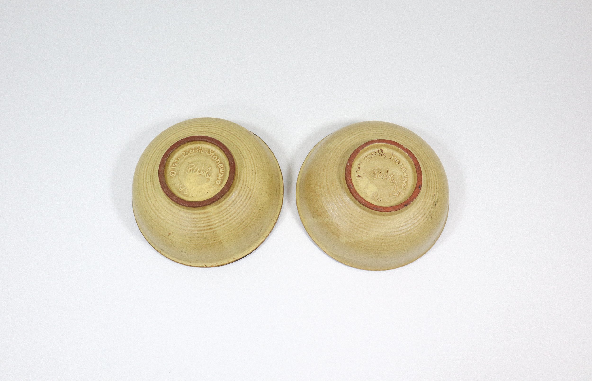 Vintage set (2) of 1970s stoneware bowls by potter Bennet Welsh for Pacific Stoneware.