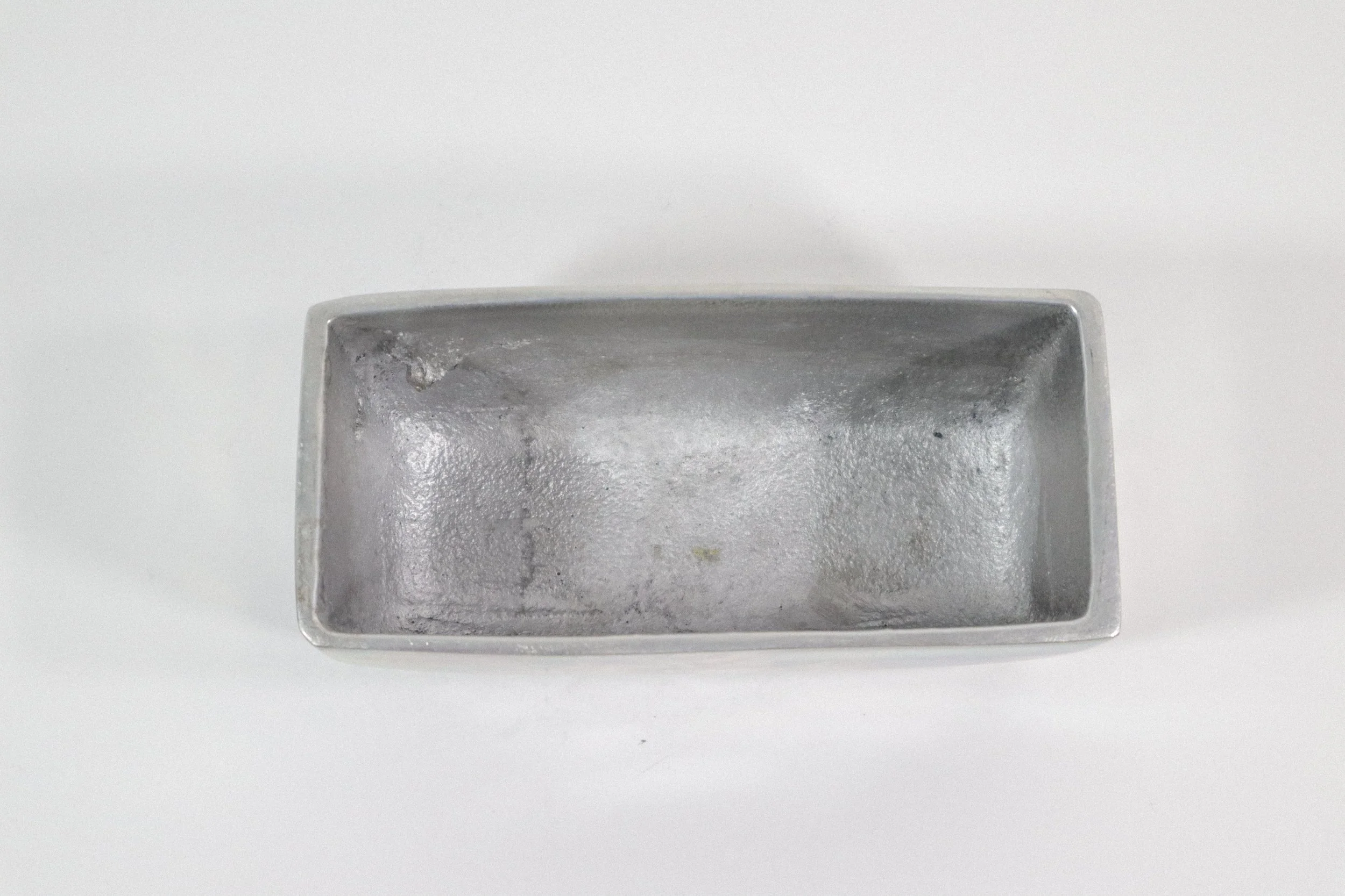 Vintage Holland Boone polished pewter lidded butter dish with a swirl design. Made in Mexico.