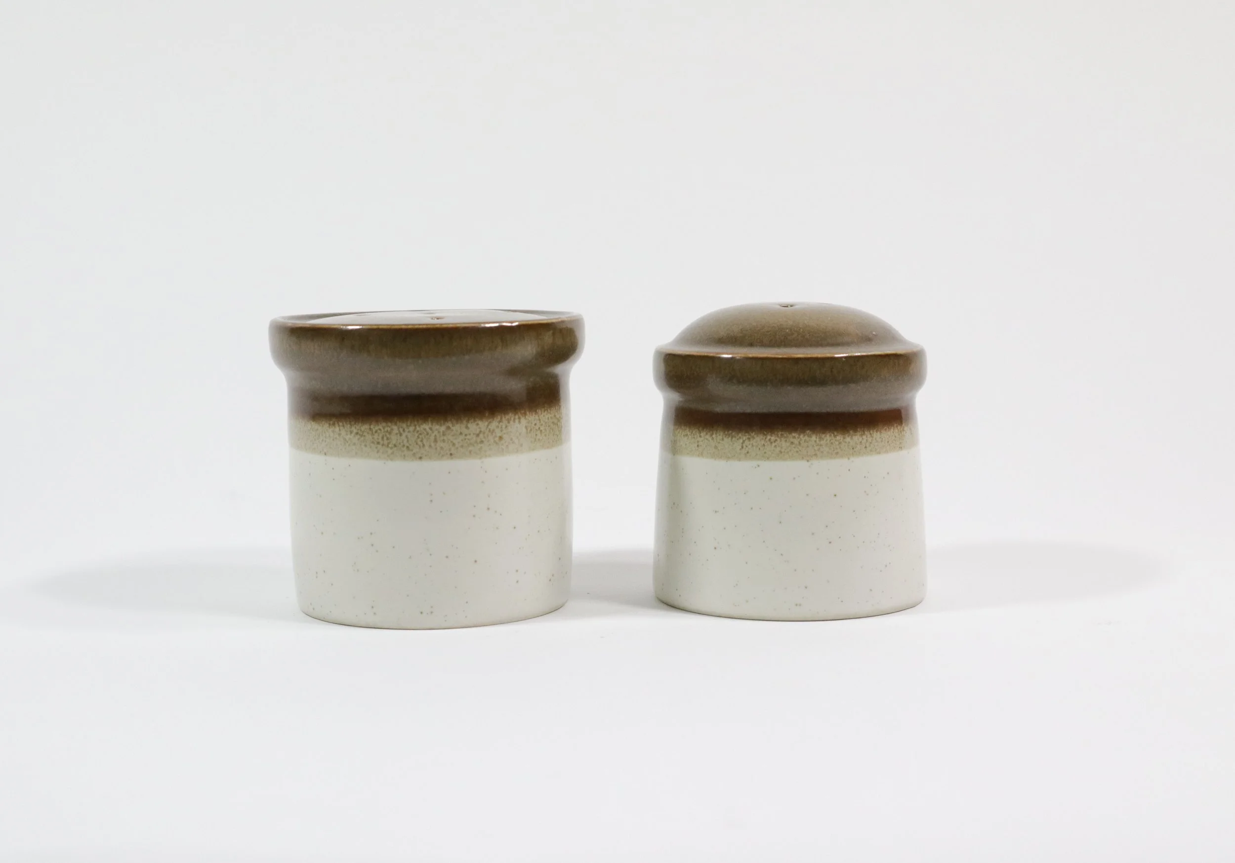 Pair of stacking Mikasa Potters Art Country stoneware salt and pepper shakers by Ben Seibel. Made in Japan.