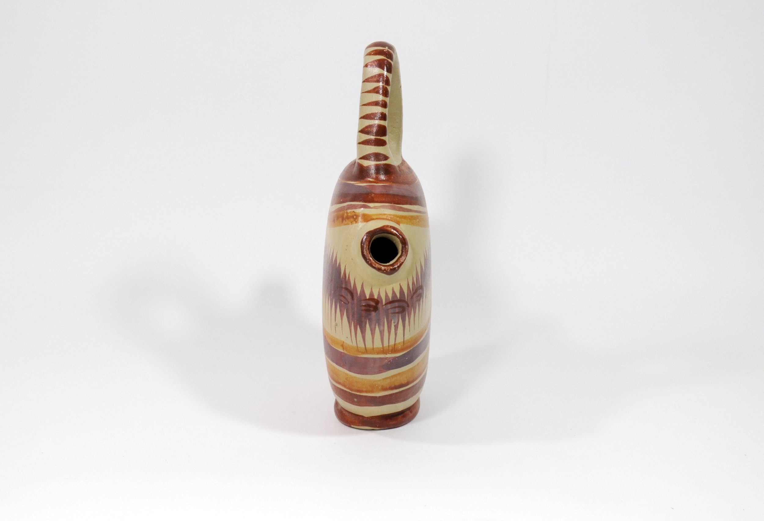 Vintage Mexican Tlaquepaque Tonala pottery jug.