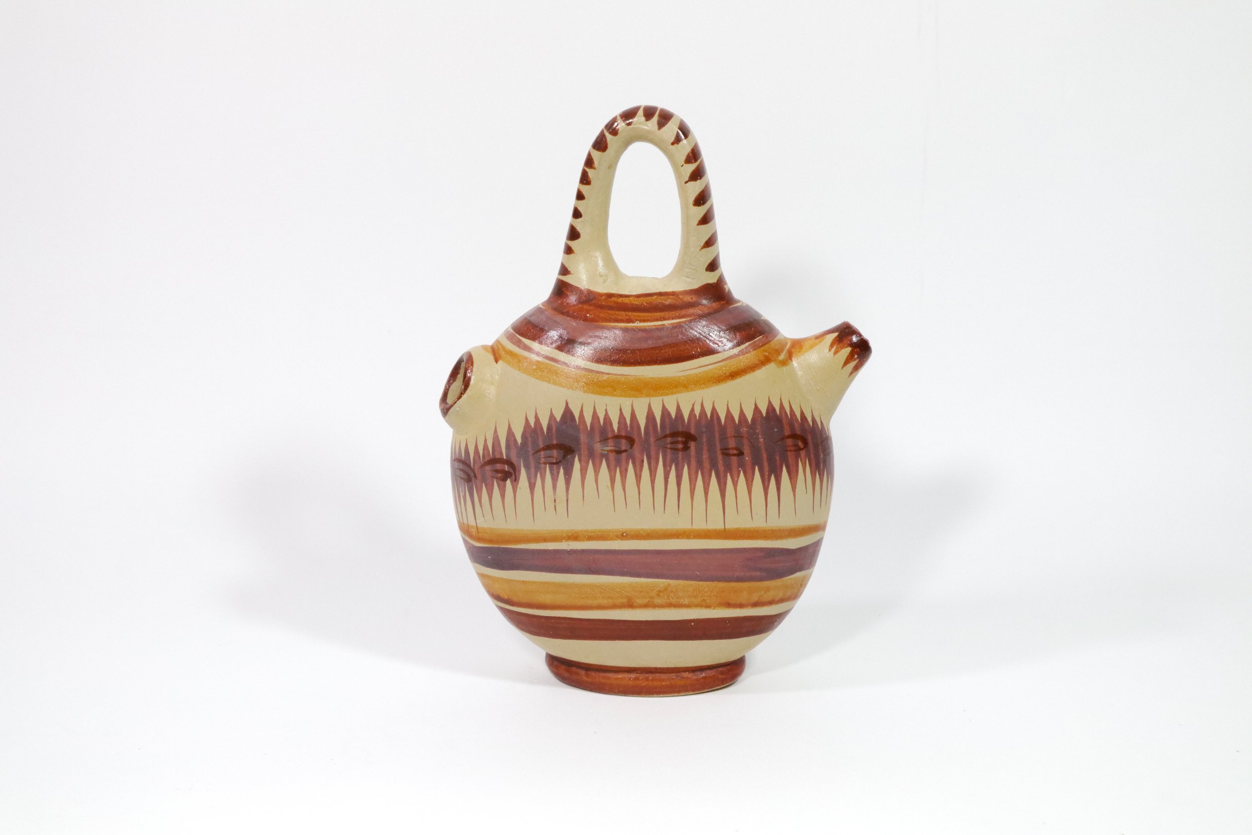 Vintage Mexican Tlaquepaque Tonala pottery jug.