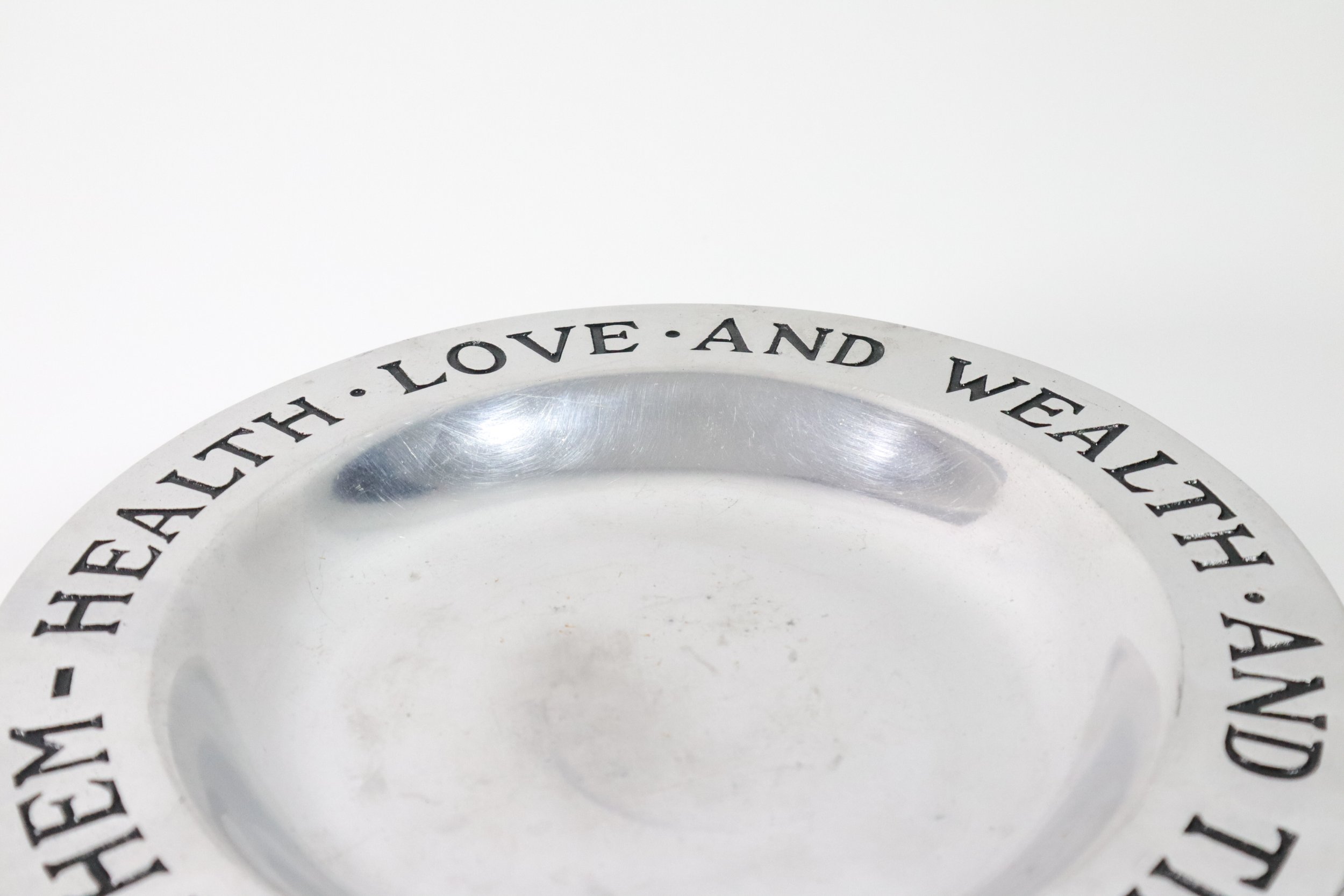 Vintage Wilton "Health, Love, and Wealth, and Time to Enjoy Them" round pewter plate.