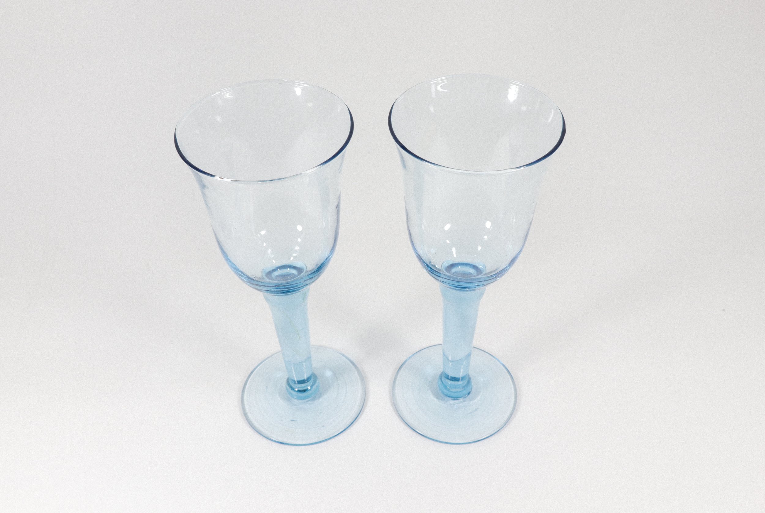 Set (2) of handblown thick stem aqua blue wine goblets.