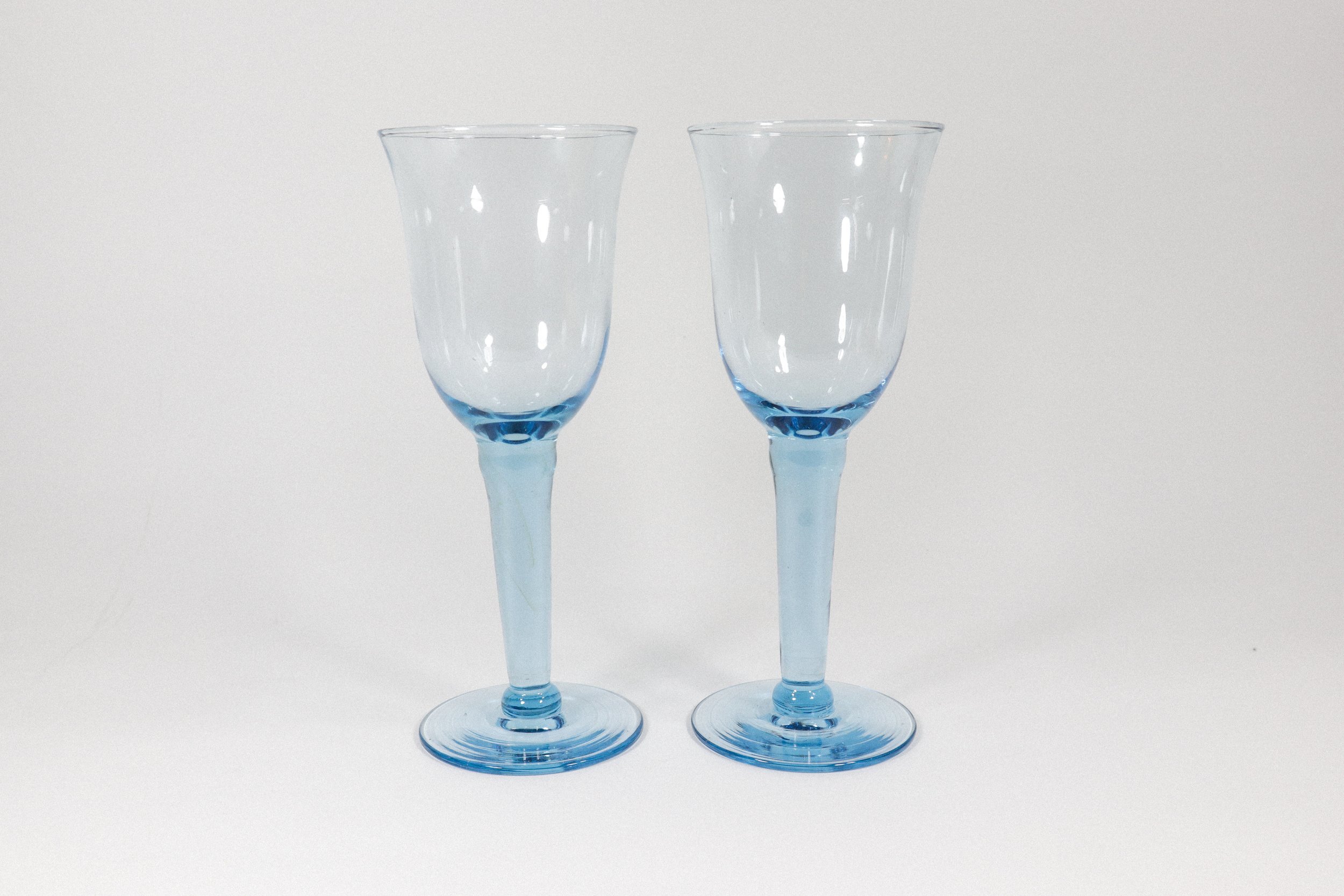 Set (2) of handblown thick stem aqua blue wine goblets.