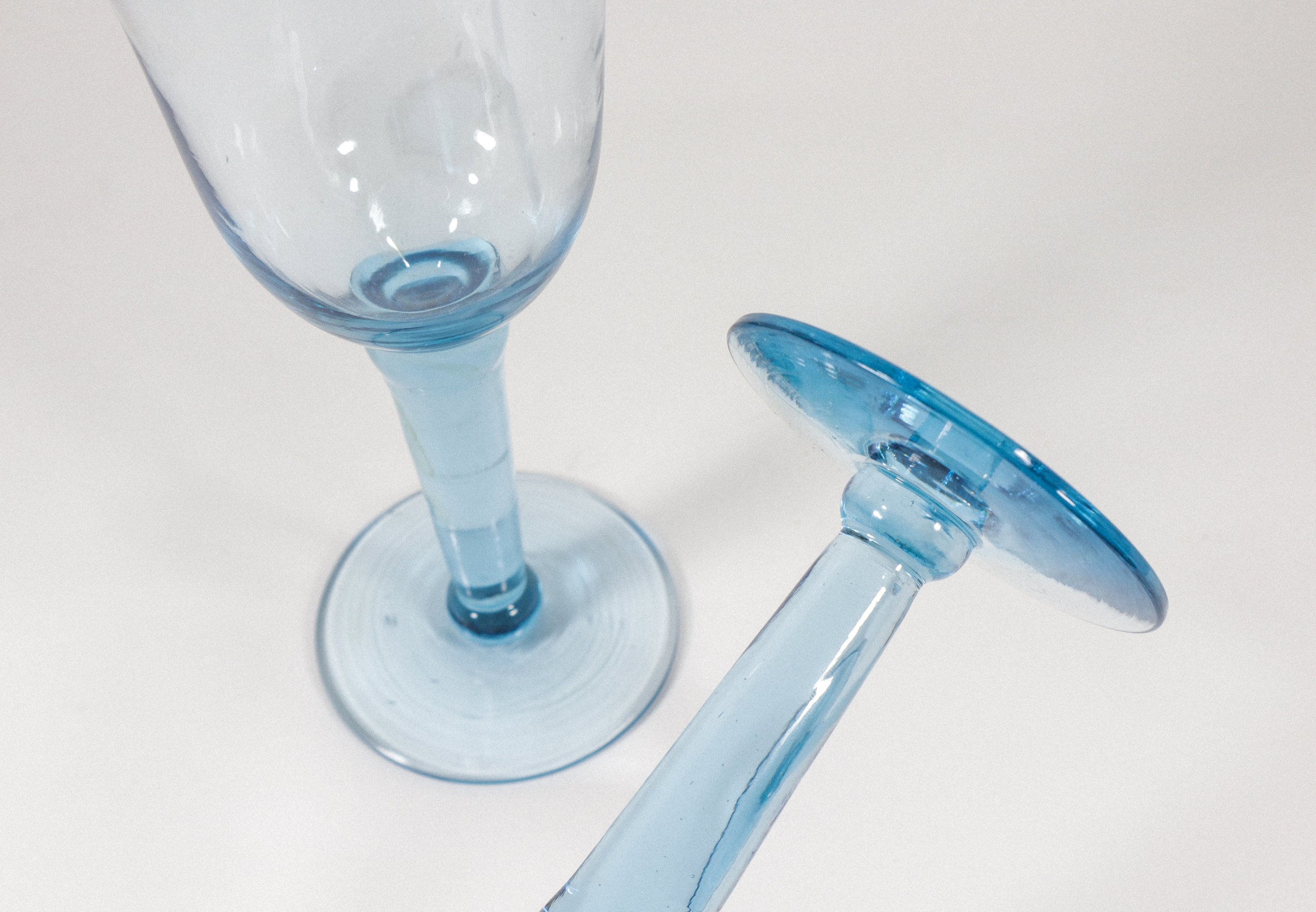 Set (2) of handblown thick stem aqua blue wine goblets.