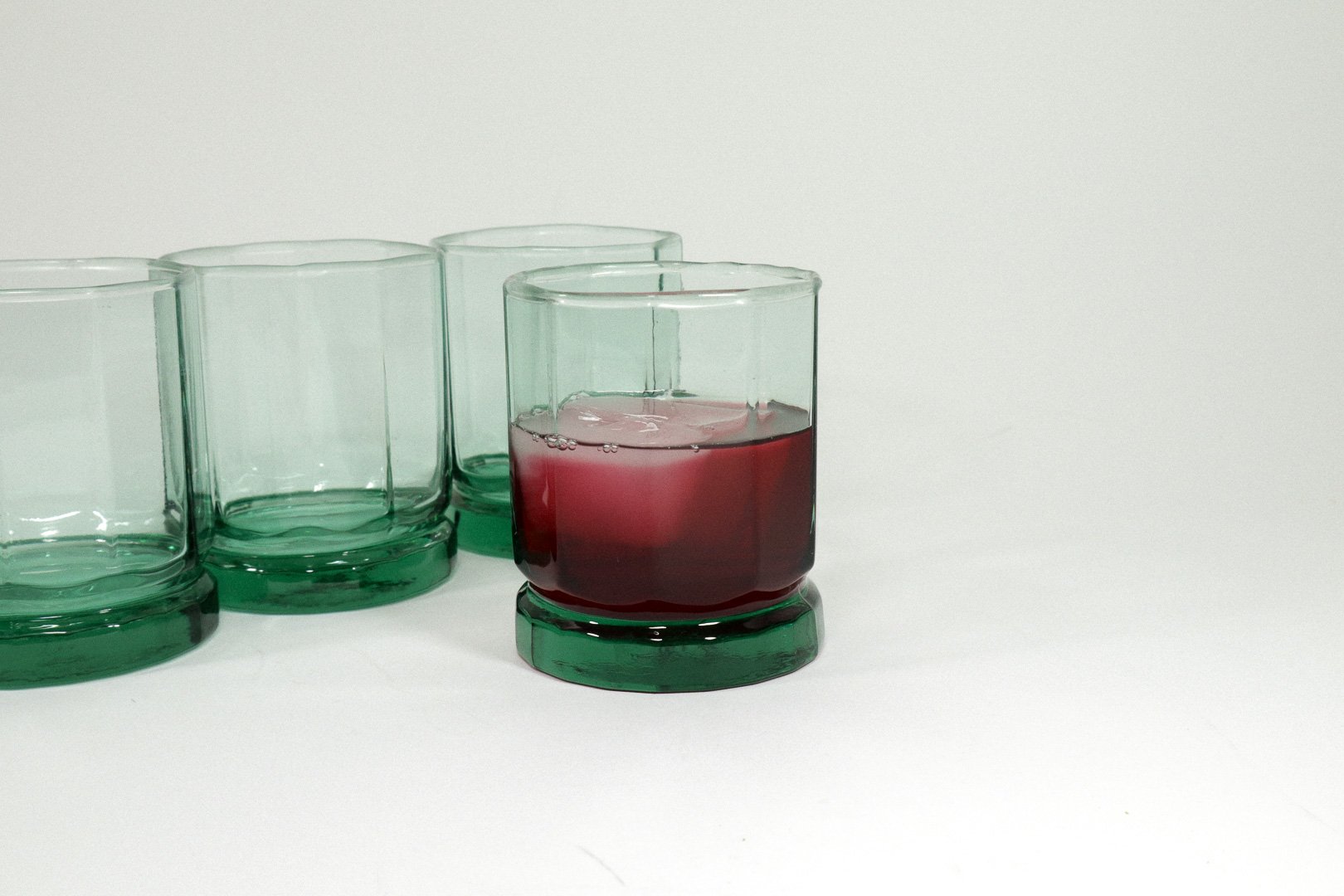 Set (4) of vintage Anchor Hocking Essex green short drinking glasses.