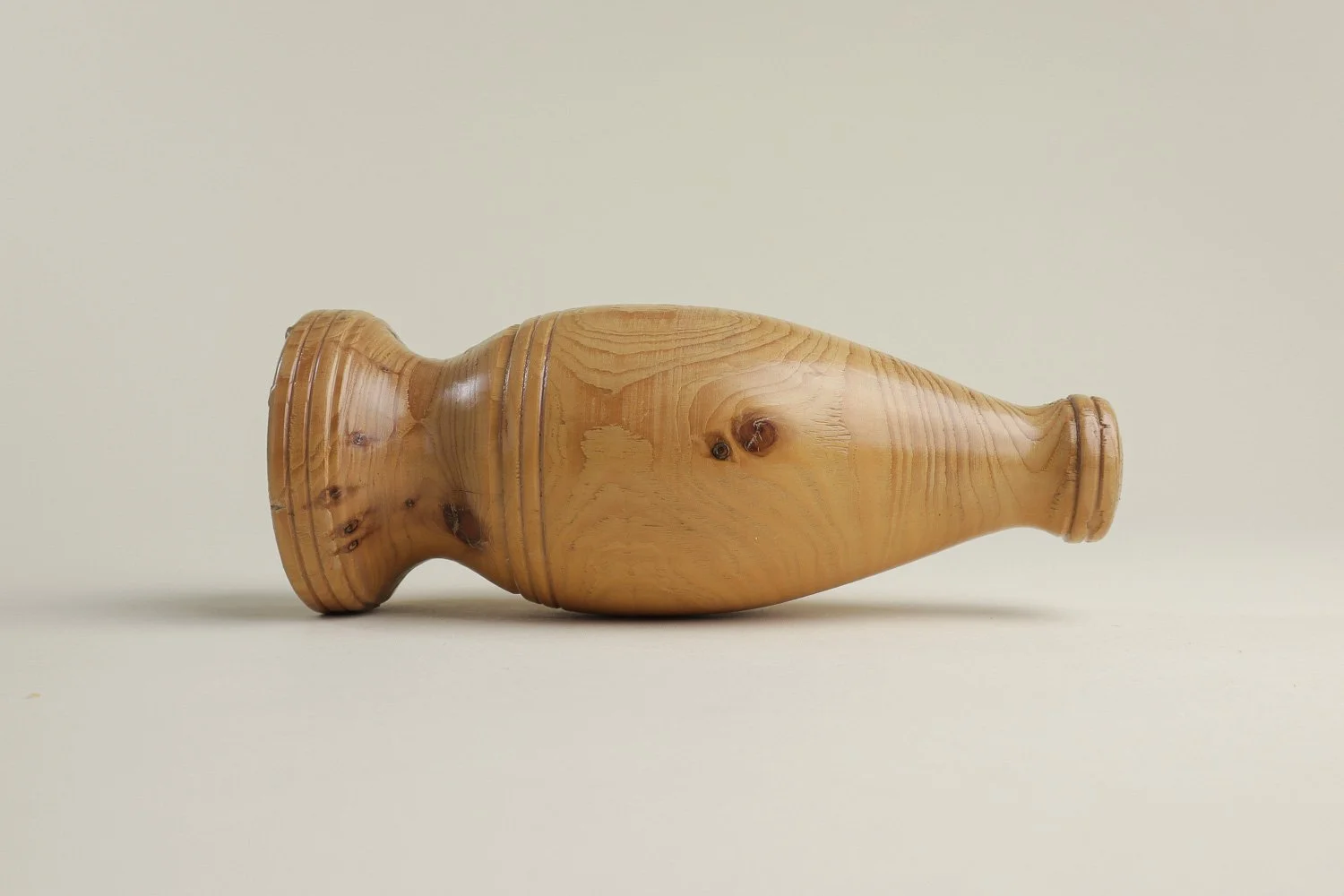 Vintage hand-turned spruce wood bud vase. Signed on the bottom by the maker R. Cooper, dated 3/10/96.