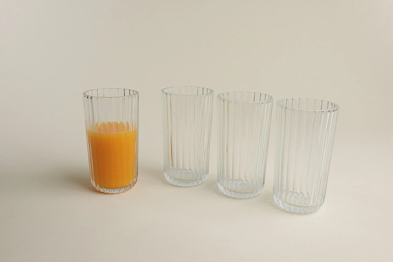 Set (4) of Italian ribbed clear juice glasses. Includes Italy stamp on the bottom.