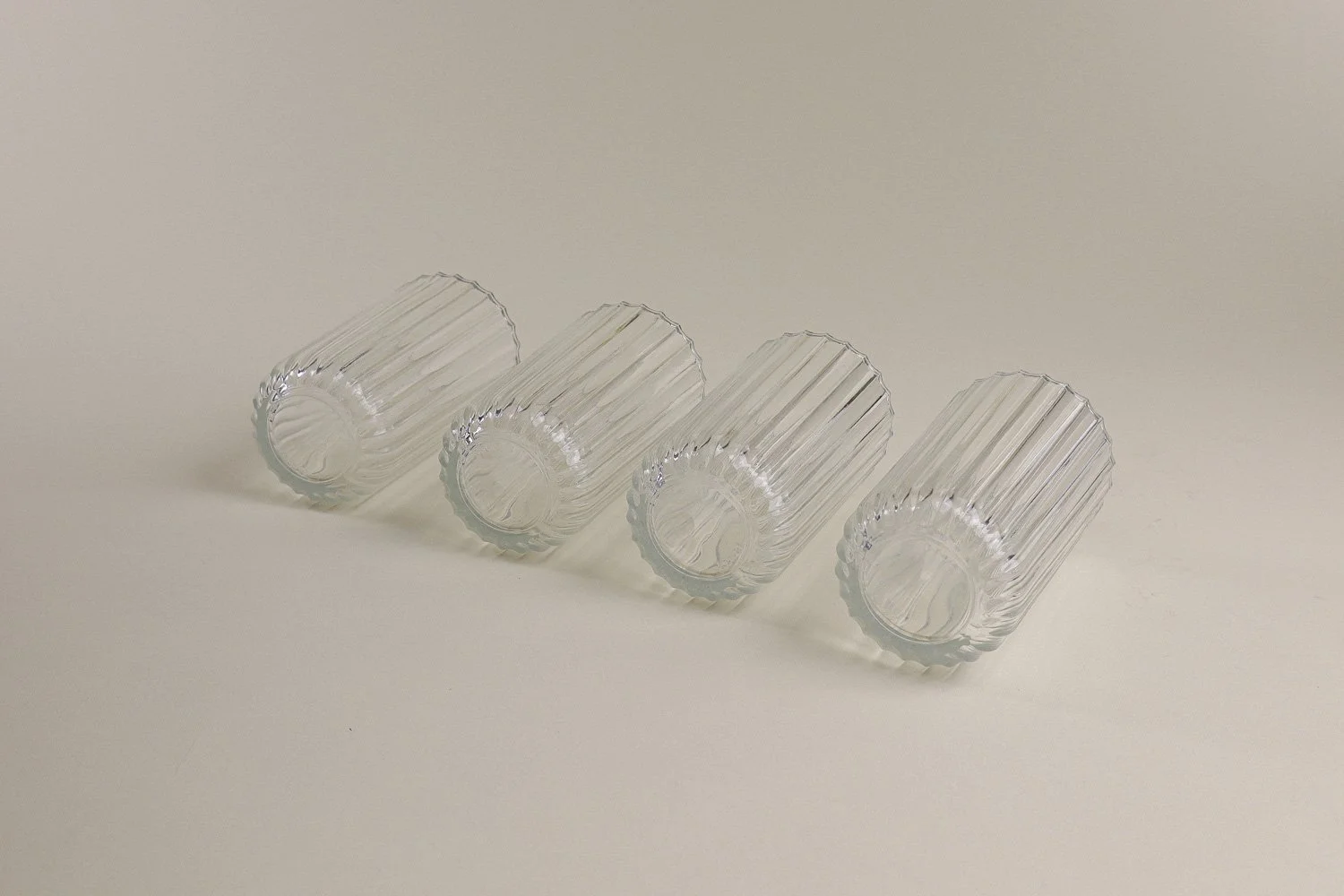 Set (4) of Italian ribbed clear juice glasses. Includes Italy stamp on the bottom.