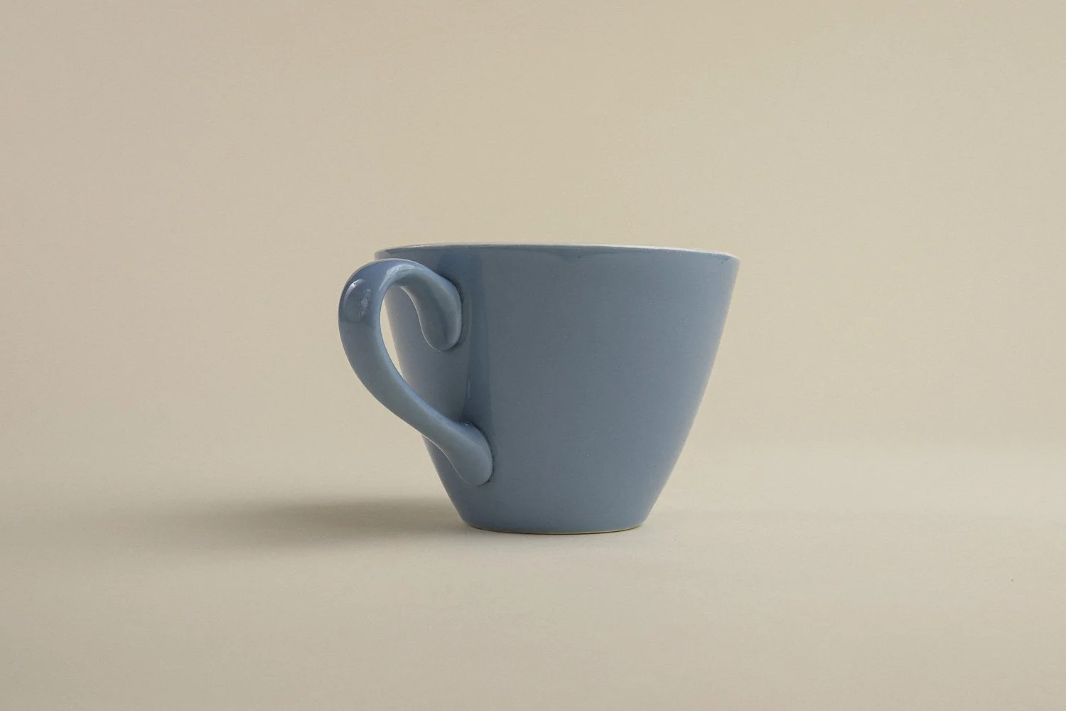 Set (4) of vintage mid-century teacups in a beautiful shade of sky blue with white interiors.