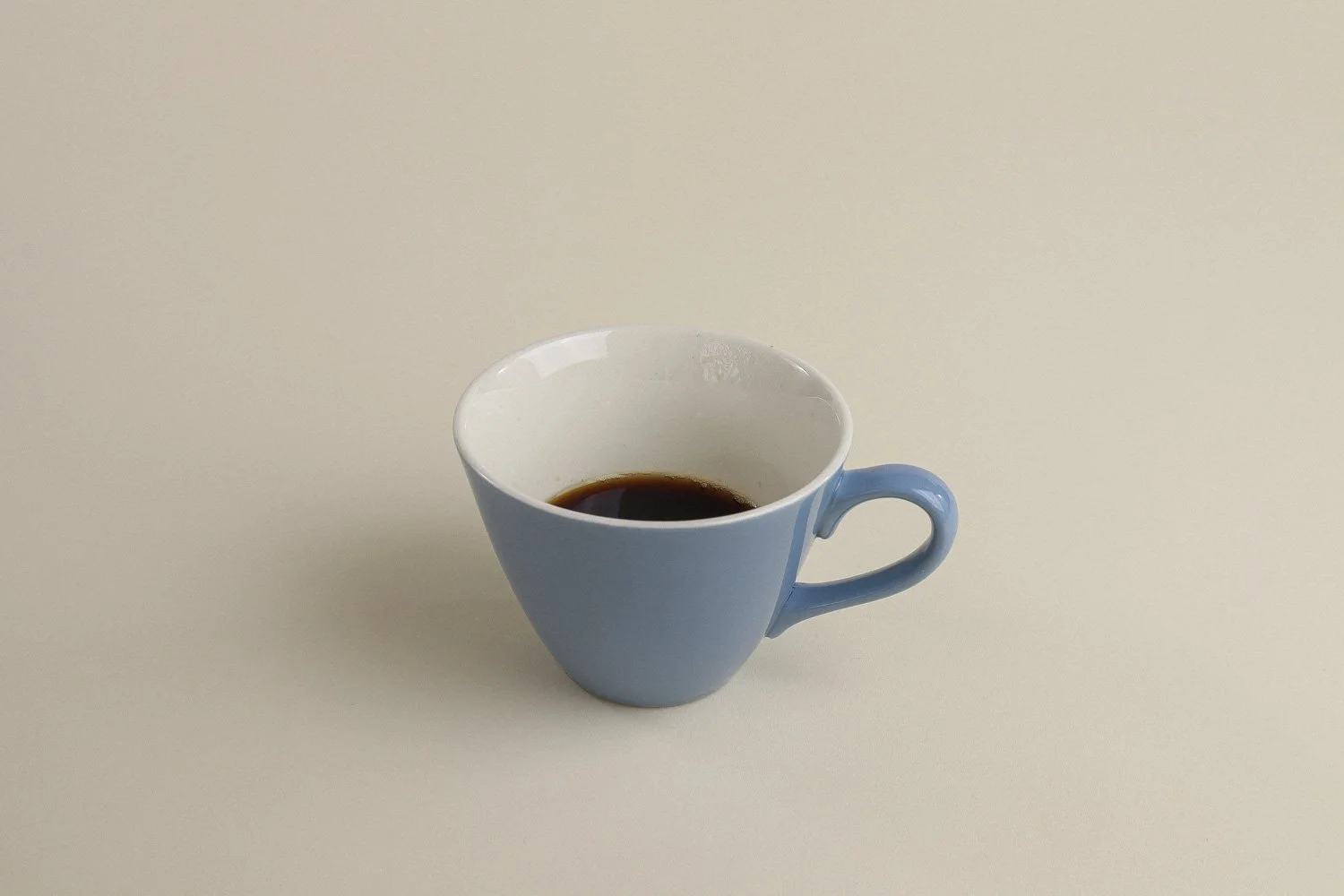 Set (4) of vintage mid-century teacups in a beautiful shade of sky blue with white interiors.