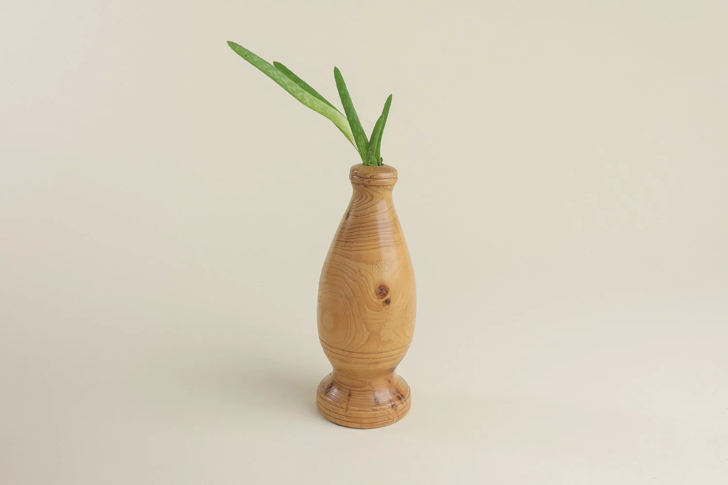 Vintage hand-turned spruce wood bud vase. Signed on the bottom by the maker R. Cooper, dated 3/10/96.