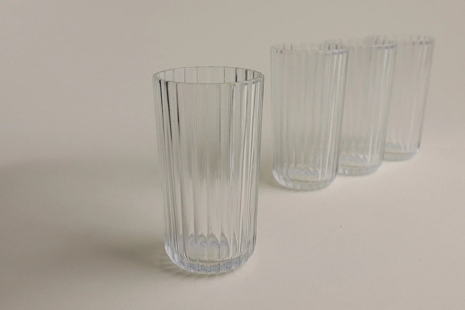 Set (4) of Italian ribbed clear juice glasses. Includes Italy stamp on the bottom.