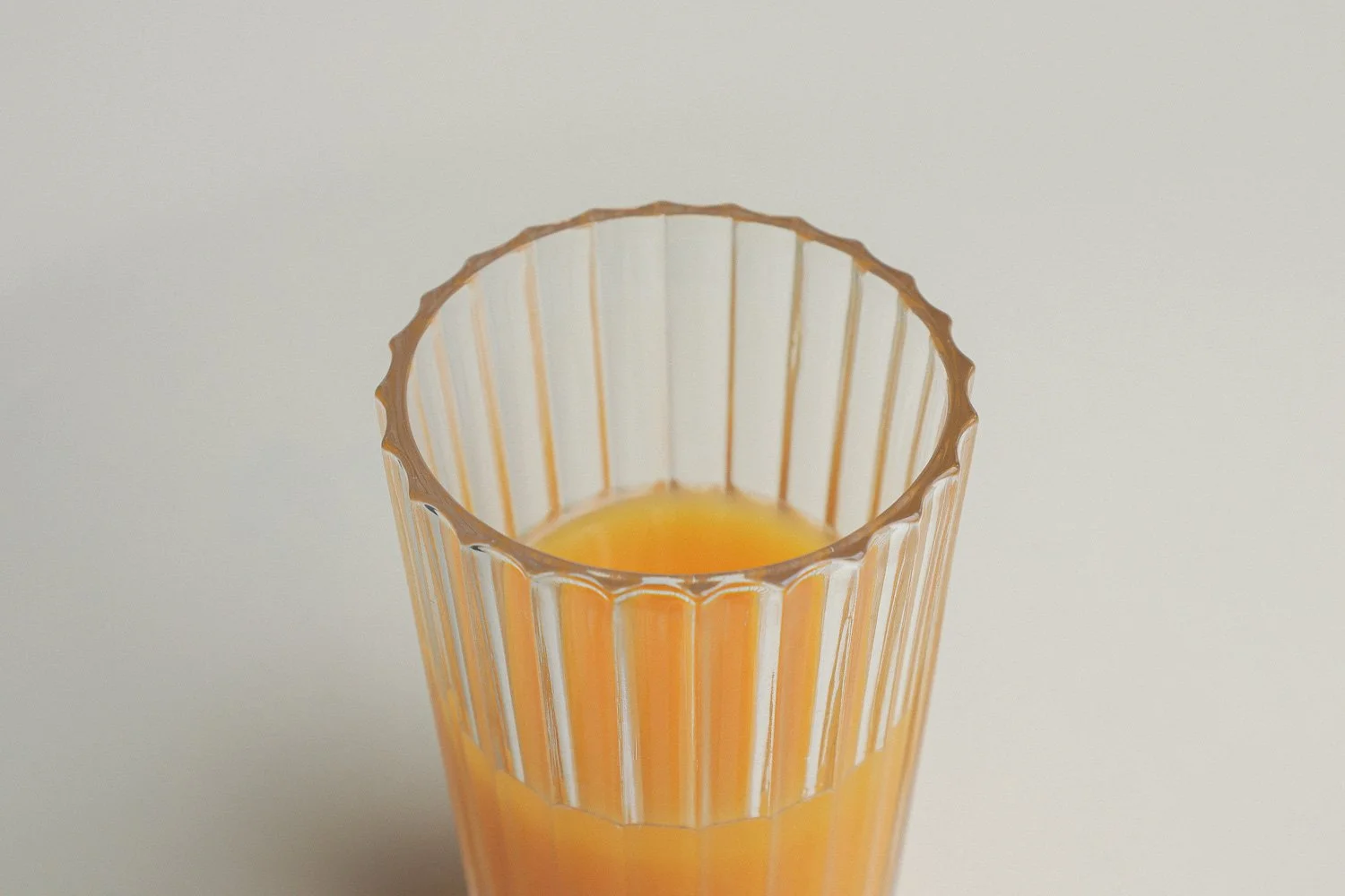 Set (4) of Italian ribbed clear juice glasses. Includes Italy stamp on the bottom.