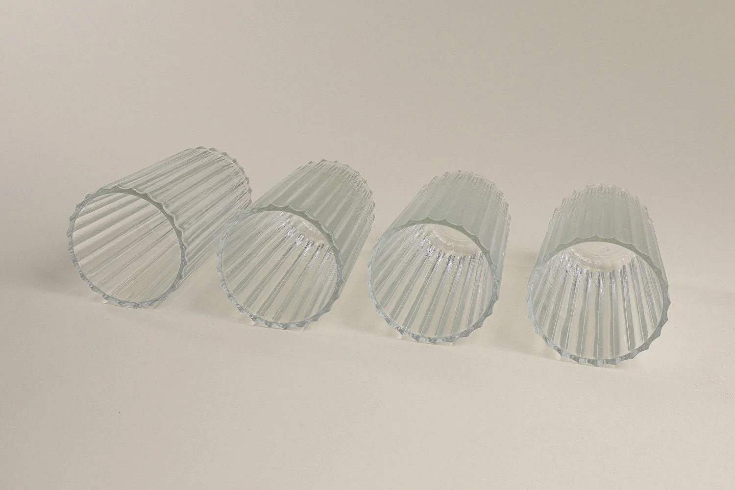 Set (4) of Italian ribbed clear juice glasses. Includes Italy stamp on the bottom.