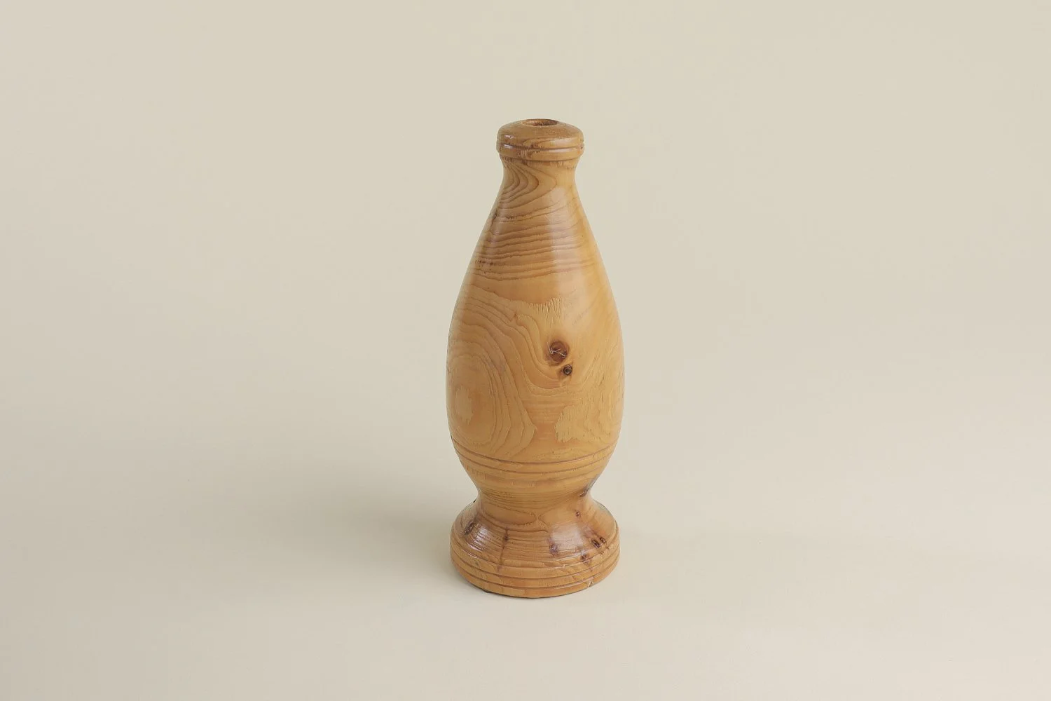 Vintage hand-turned spruce wood bud vase. Signed on the bottom by the maker R. Cooper, dated 3/10/96.