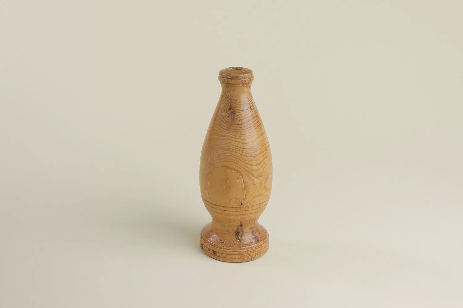 Vintage hand-turned spruce wood bud vase. Signed on the bottom by the maker R. Cooper, dated 3/10/96.