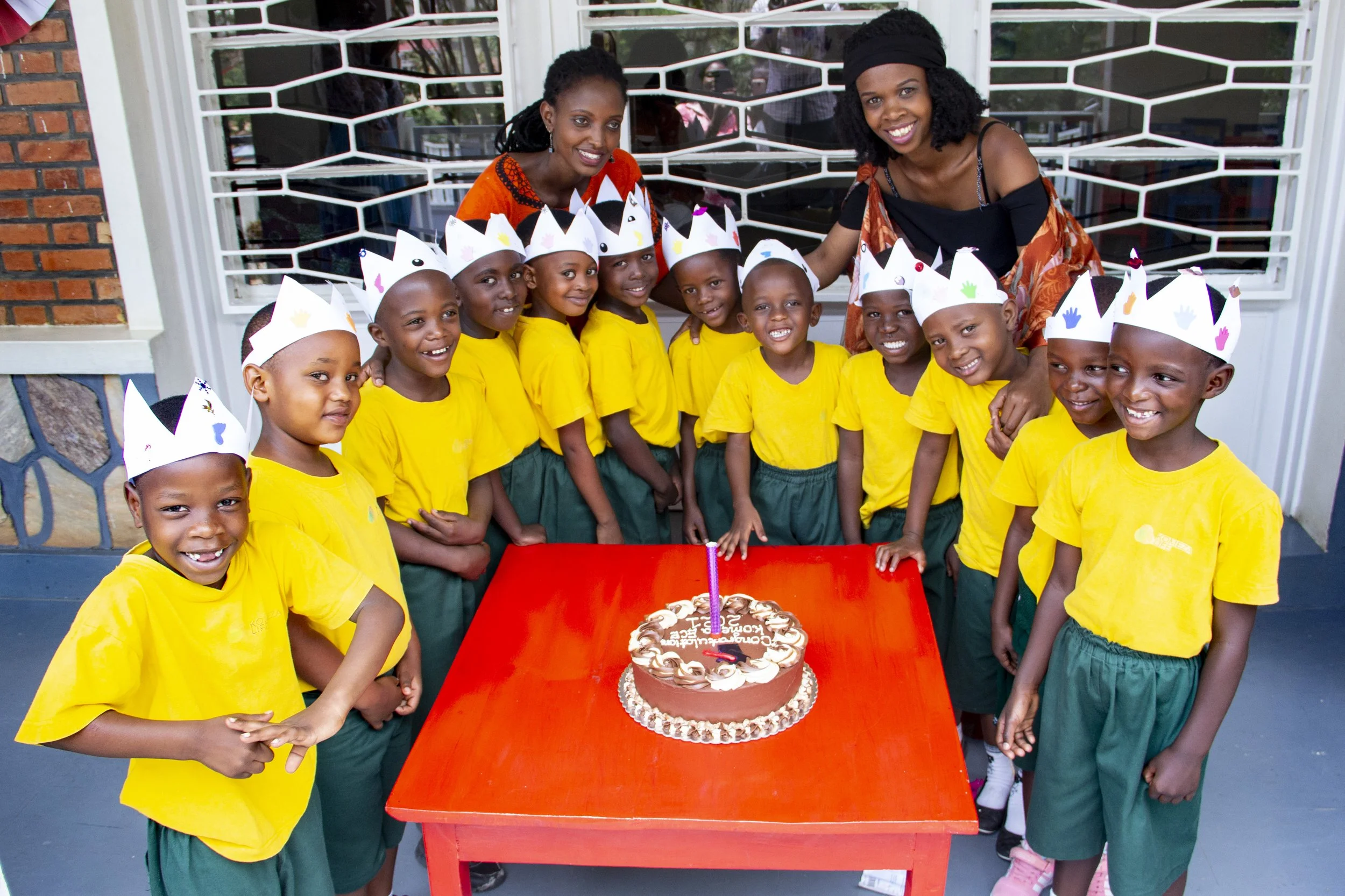 Kids with the cake.JPG