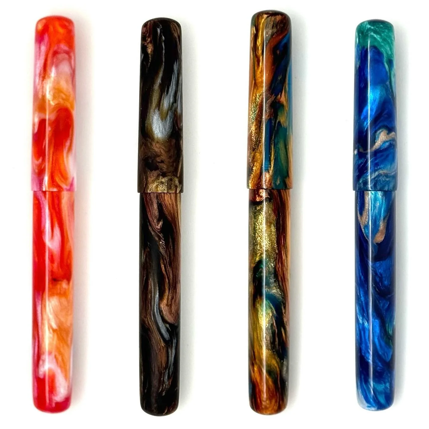 Four more for DC! All new or unreleased materials!

Left to right:

Wedding Bells
Precious Metals
Poseidon&rsquo;s Palace
Island Echo

All take Jowo 6 or Osprey nibs, and all will be available at the show!  Thanks for looking and let me know if you h