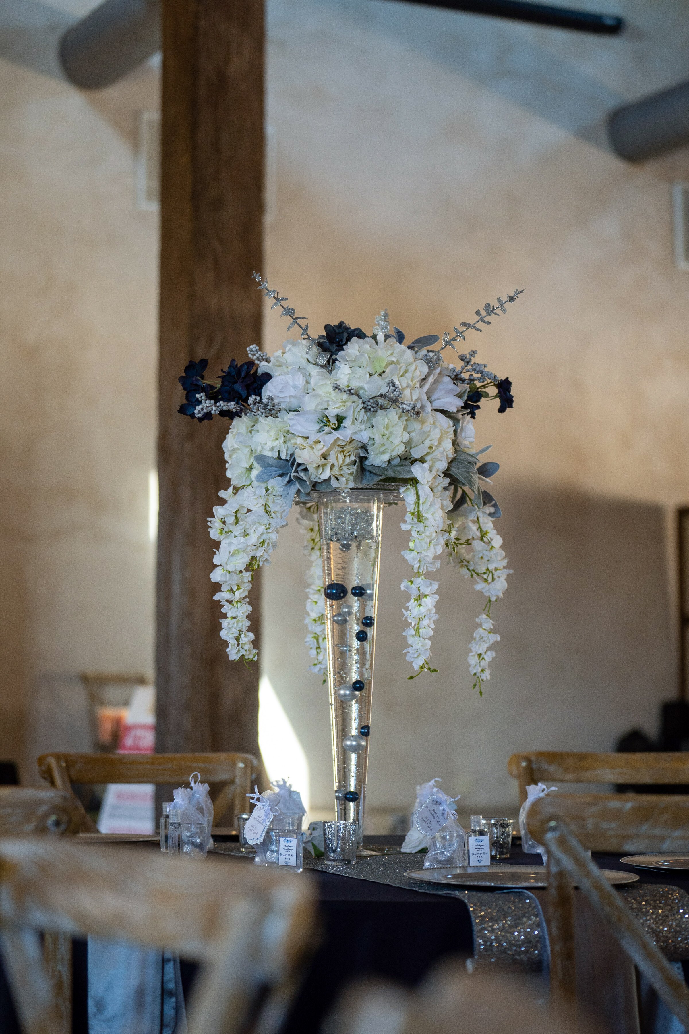 wedding centerpiece ideas tall faux floral blue and silver