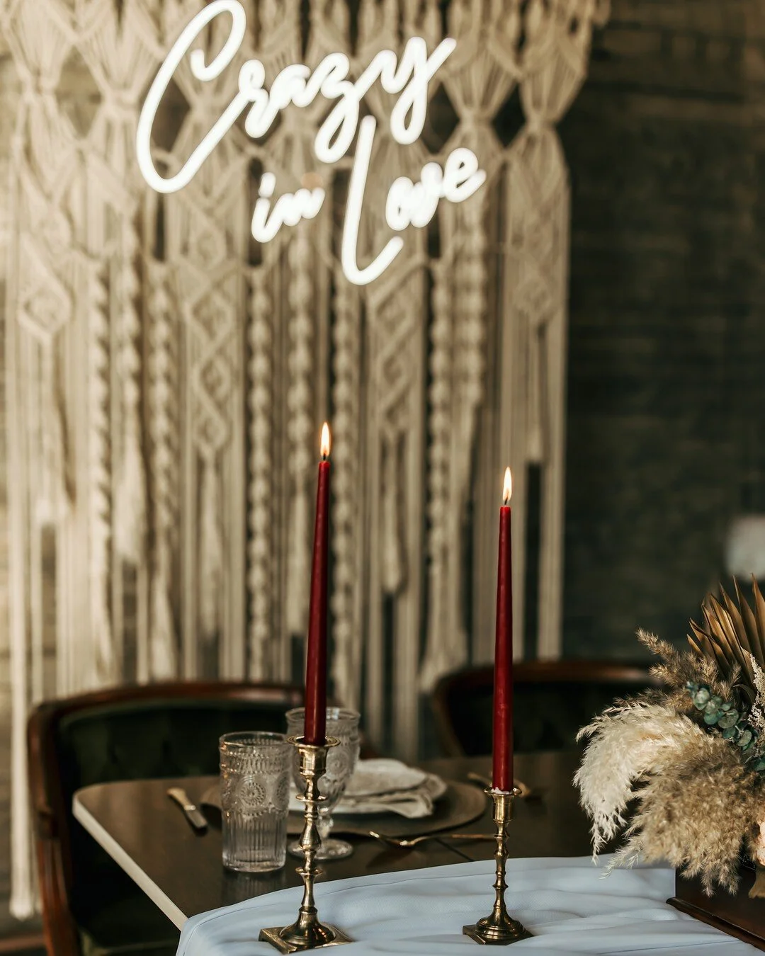 Setting the mood for your wedding can easily be done with lighting. I love when candles are used to set the mood, as well as bring out pops of colour throughout the room

Keep in mind, most venues do not allow you to have open flames (as shown in thi