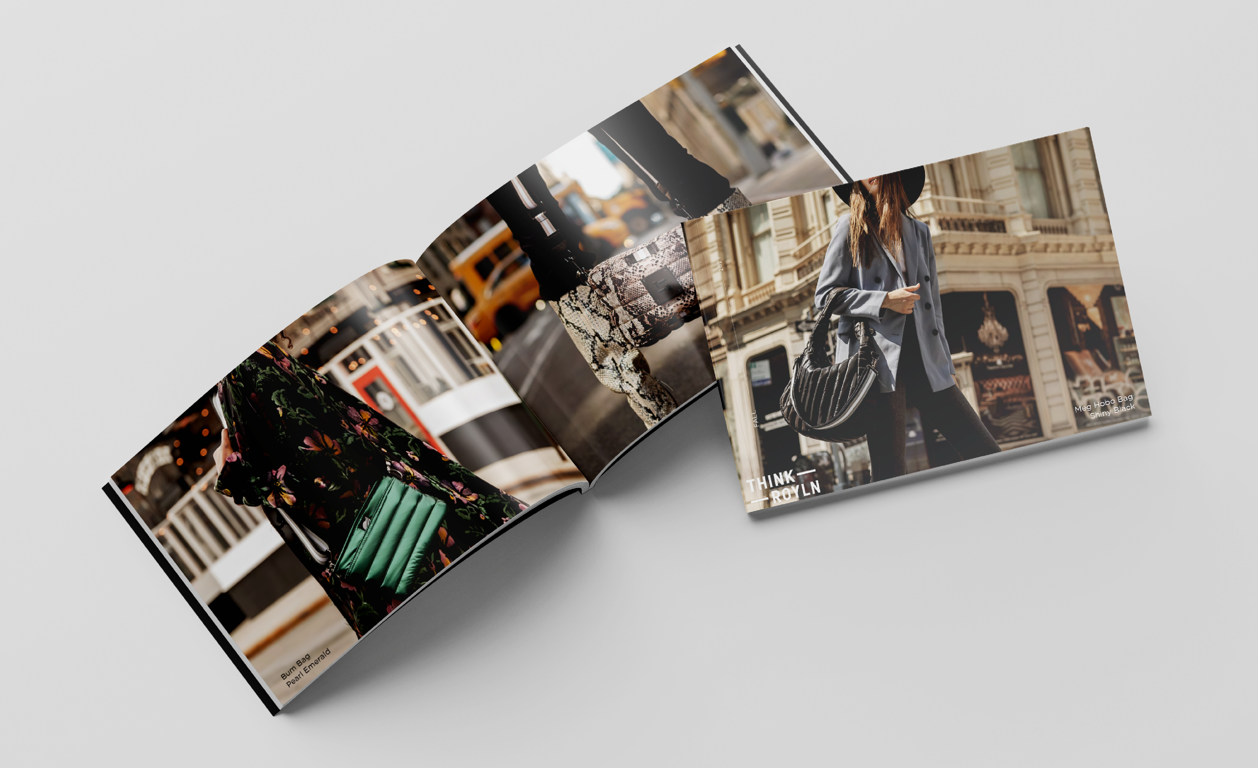 Open magazine featuring fashion accessories and street style photos, including handbags and models in urban settings.