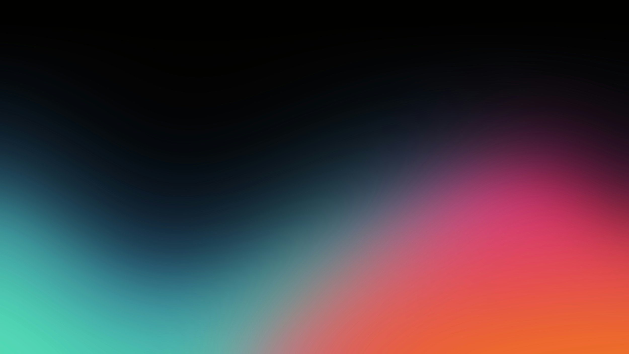 Blurred colorful background with shades of black, pink, blue, and green.
