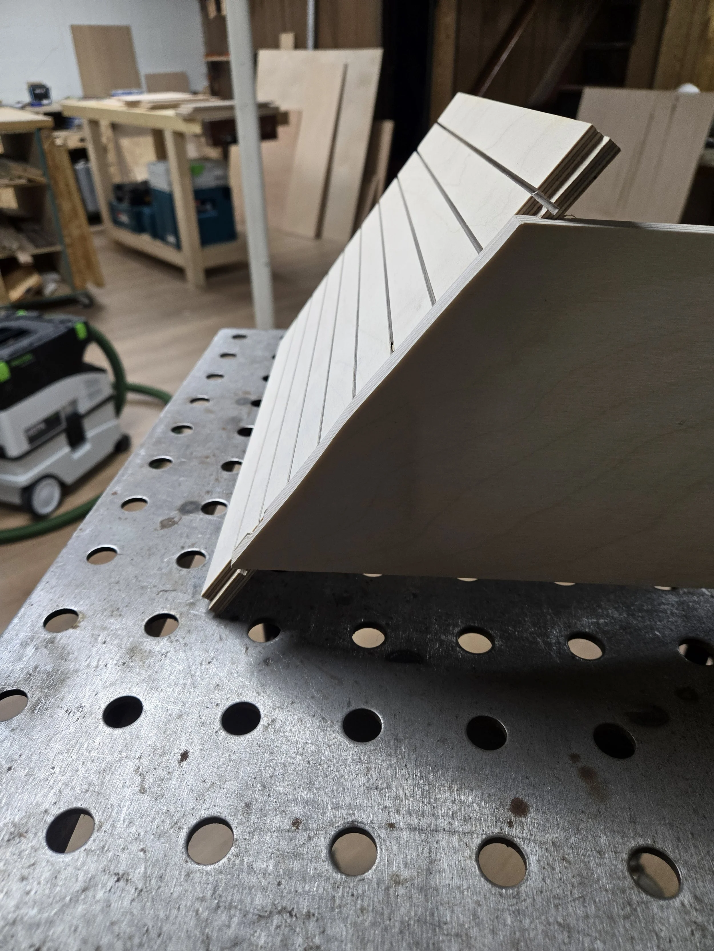 The drawer sides form the curve that the fronts will bend to