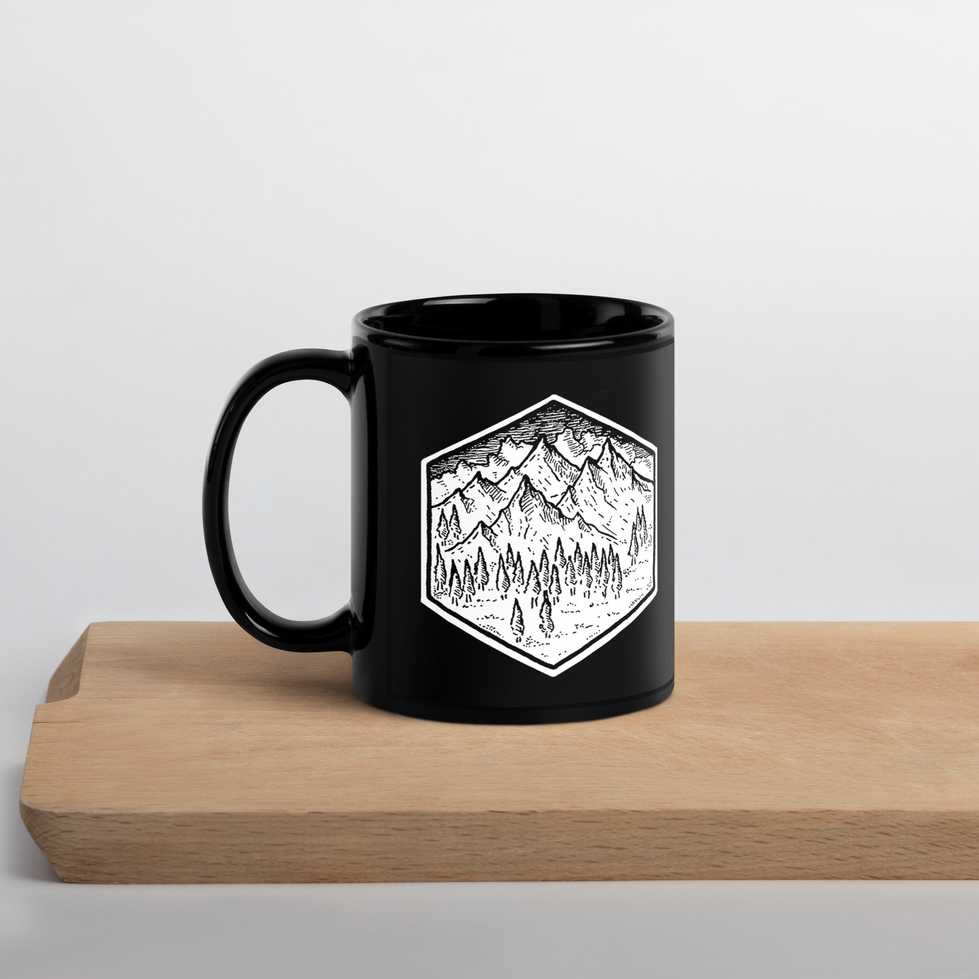 black-glossy-mug-black-11oz-handle-on-left-6365c3e19eeae.jpg