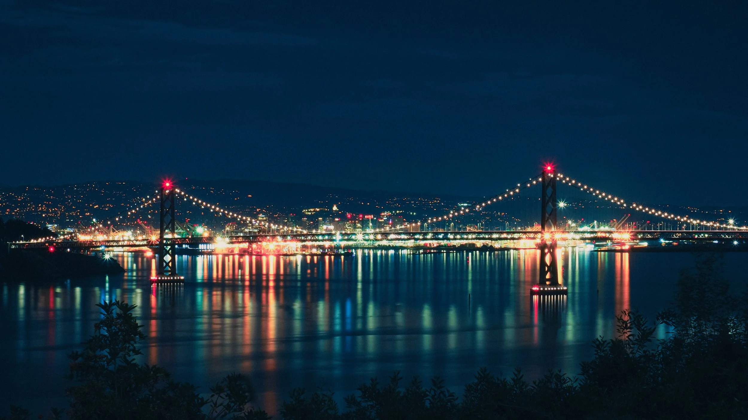 View from Coit Tower at night. Overlooking Oakland Bridge. 