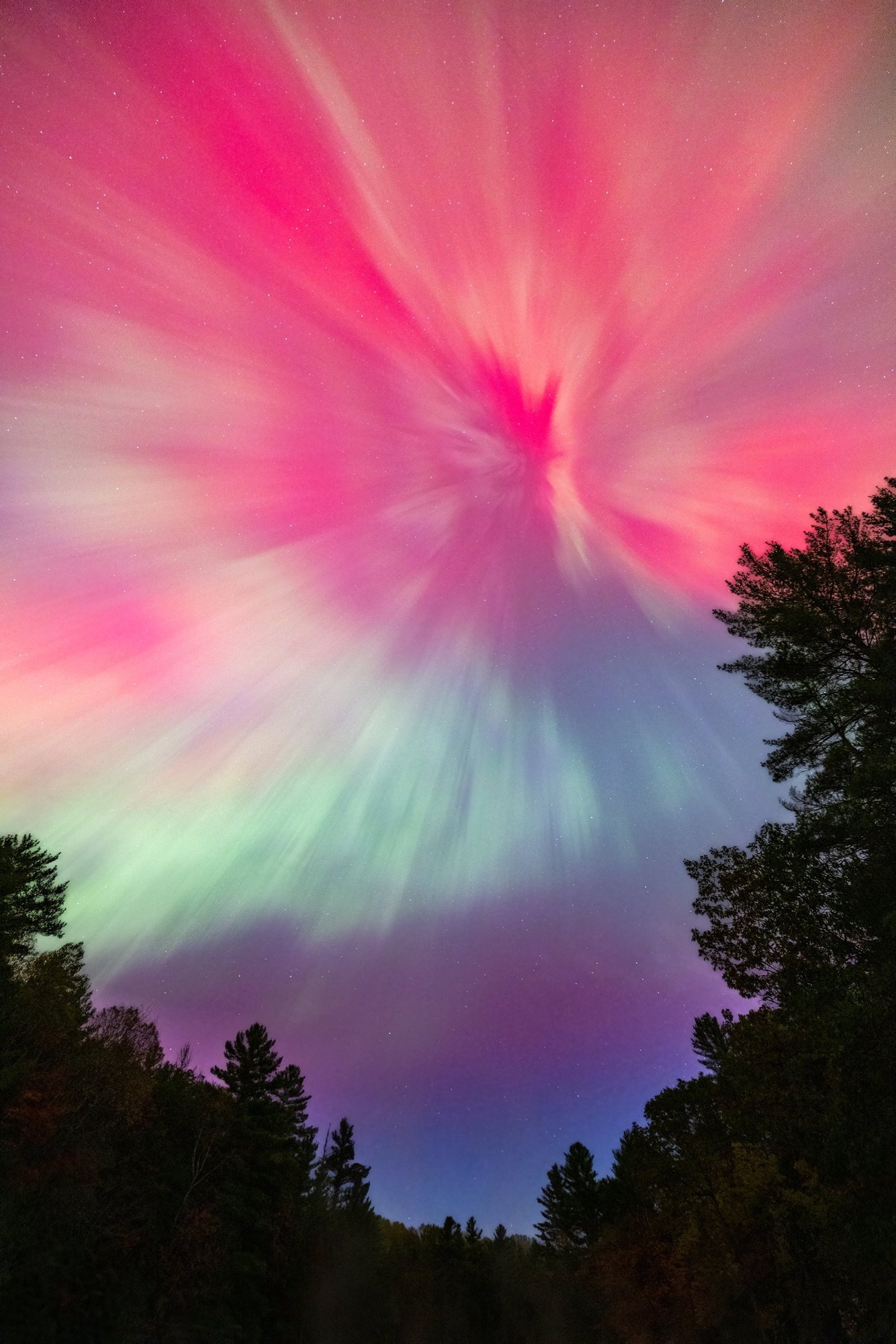 03 Northern lights glowing over a lake in Algonquin Park.jpg