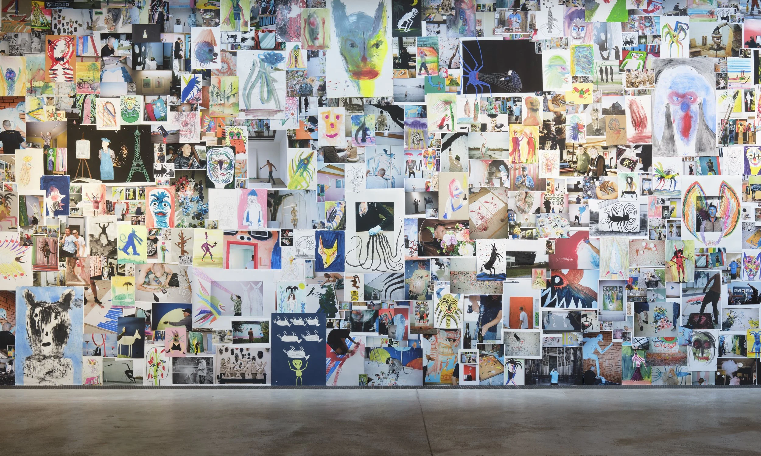 Collage of various colorful artworks, paintings, and photographs displayed on a large wall in an art gallery. Frederik Næblerød All Walks of Life exhibition at Arken Museum of Contemporary Art.