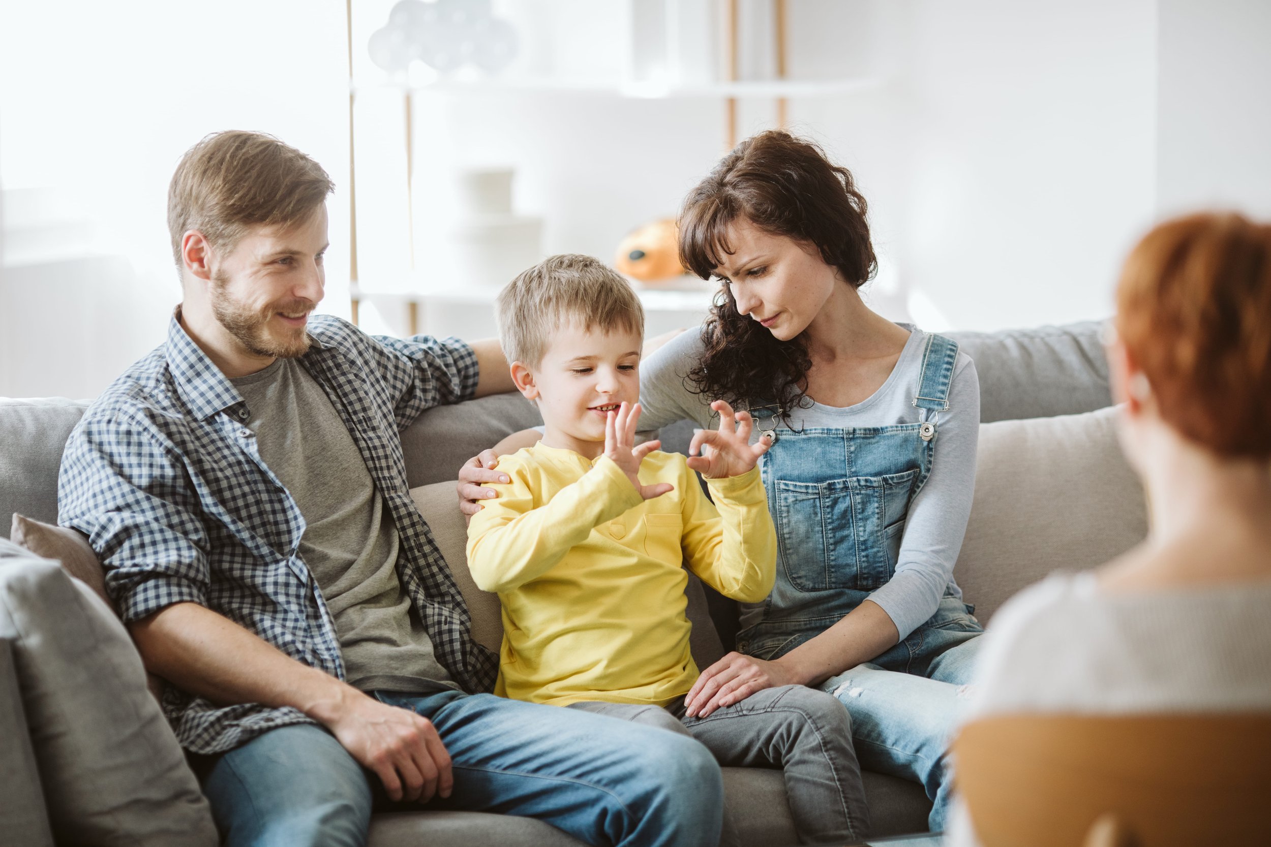 expat family talking to a therapist