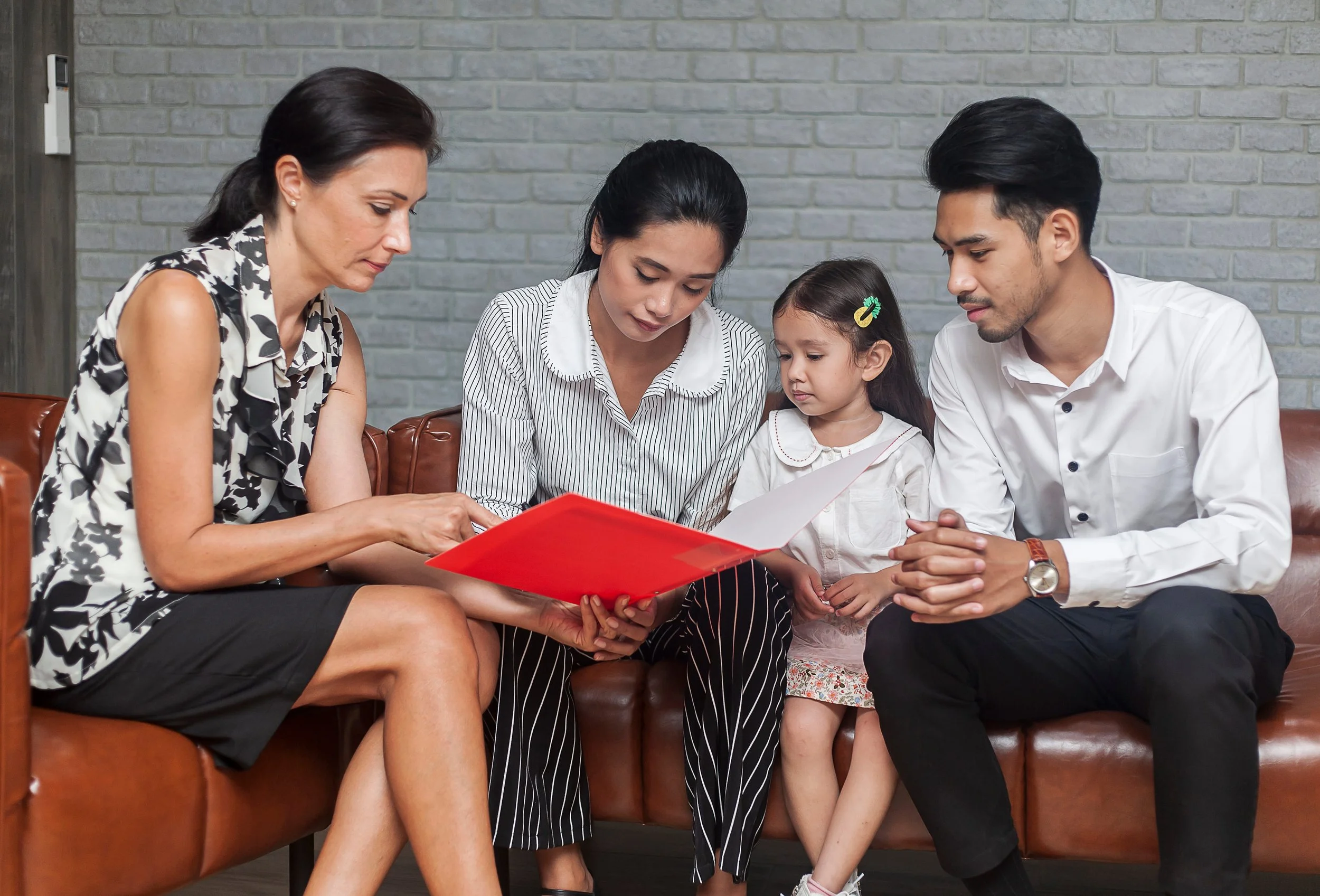 expat parents talking with a therapist for advice