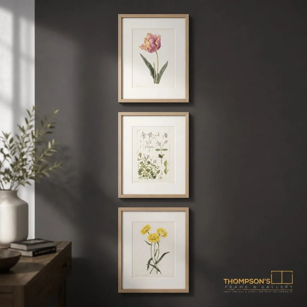 Contemporary Classicism at its finest!! 🌿 We are obsessed with how this botanical trio brings a high-end, timeless feel to this space. By pairing simple light wood frames with crisp white mats, you get an elevated look that works for any room. 

Whe