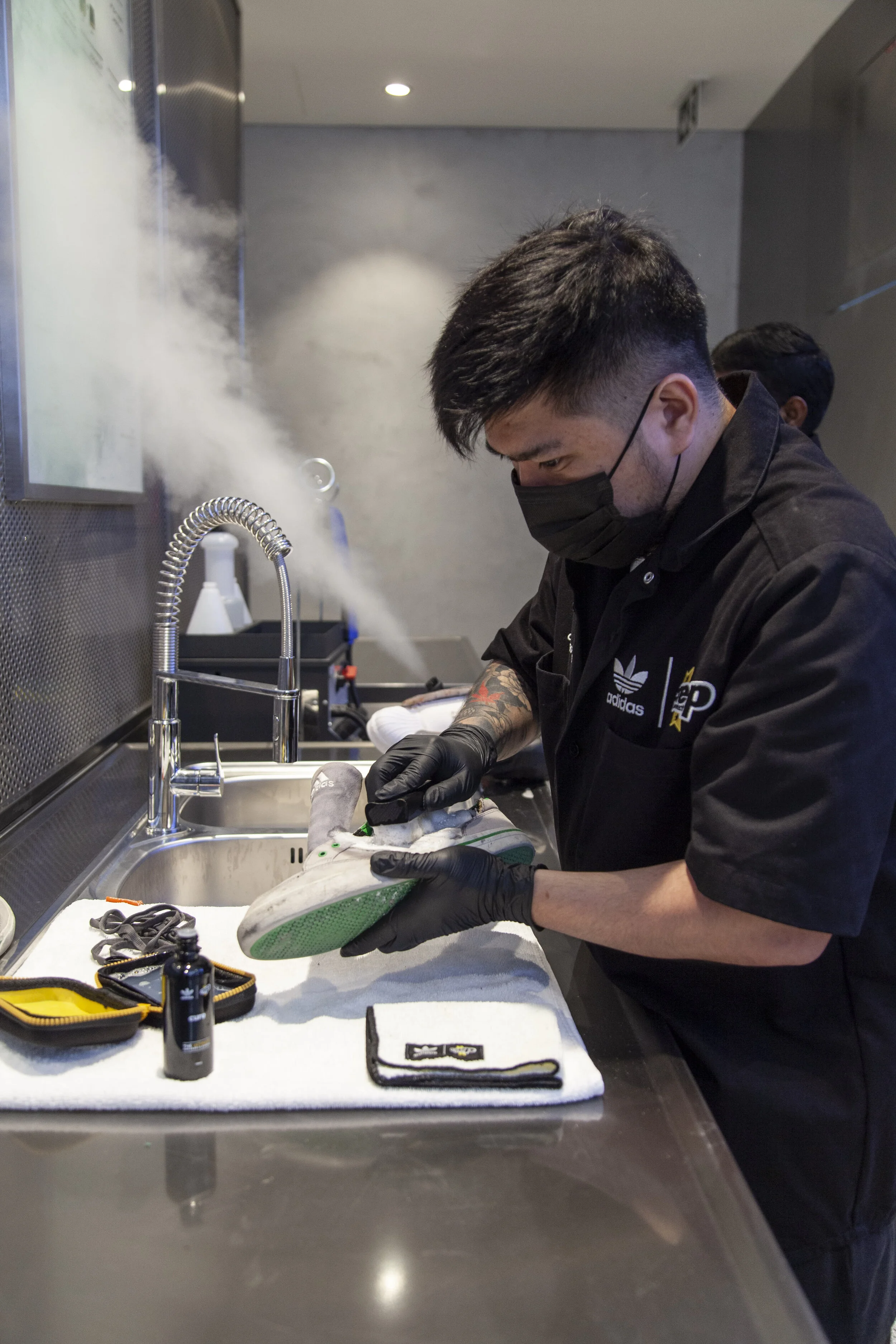 adidas-flagship-store-dubai sneaker cleaning service with specialist restoring footwear