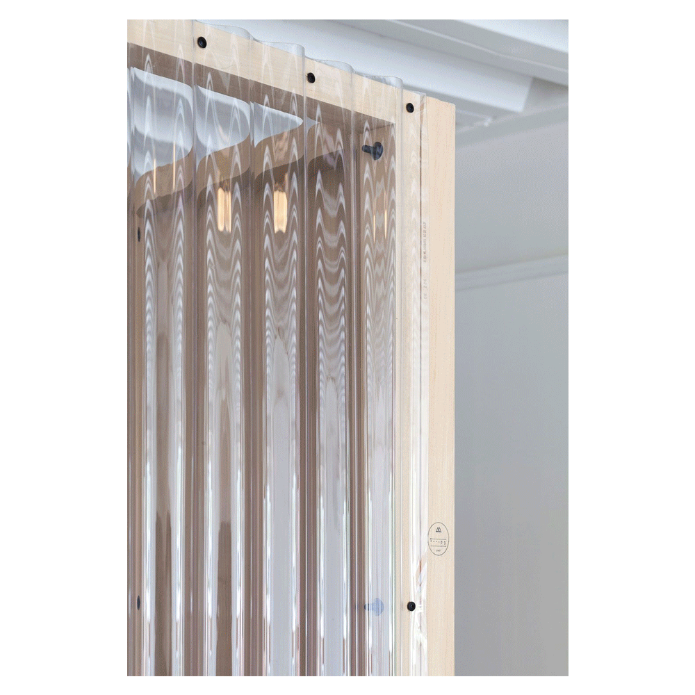 Detail of translucent corrugated panel system used within the American Eagle Flagship Store Las Vegas interior.