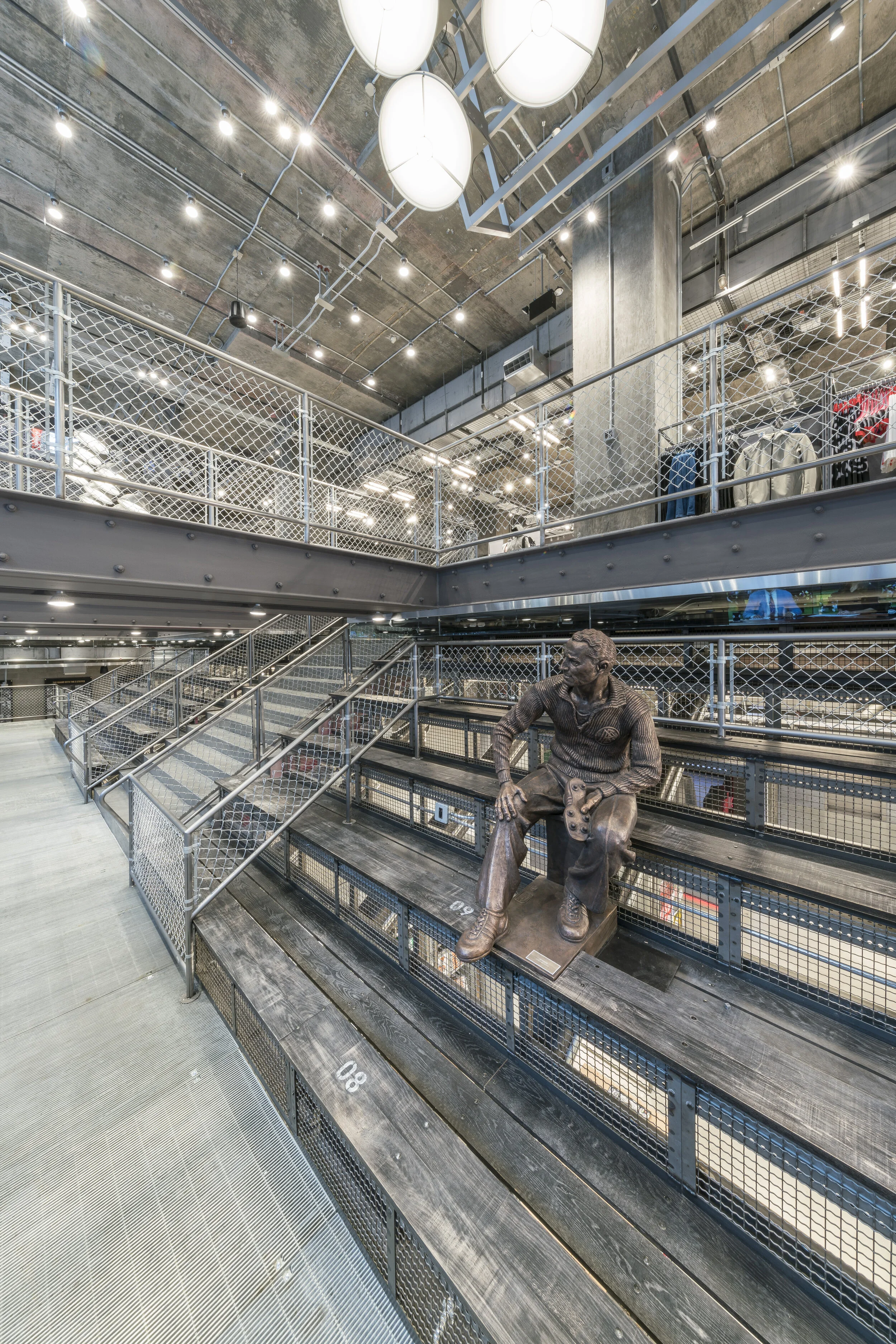 Bleacher seating with sculptural installation inside Adidas Flagship