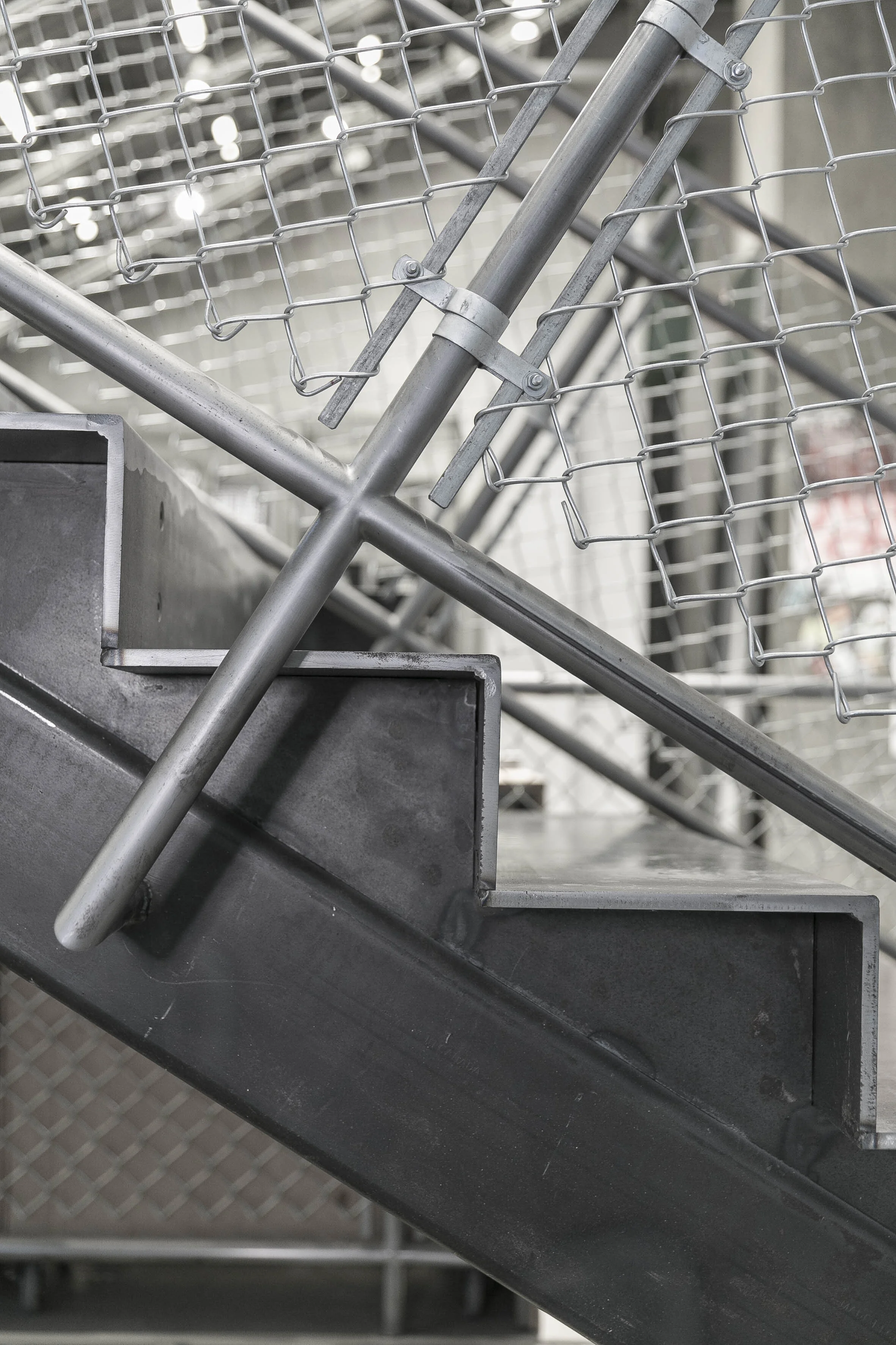Close-up of steel framework and mesh detailing at Adidas Flagship NYC