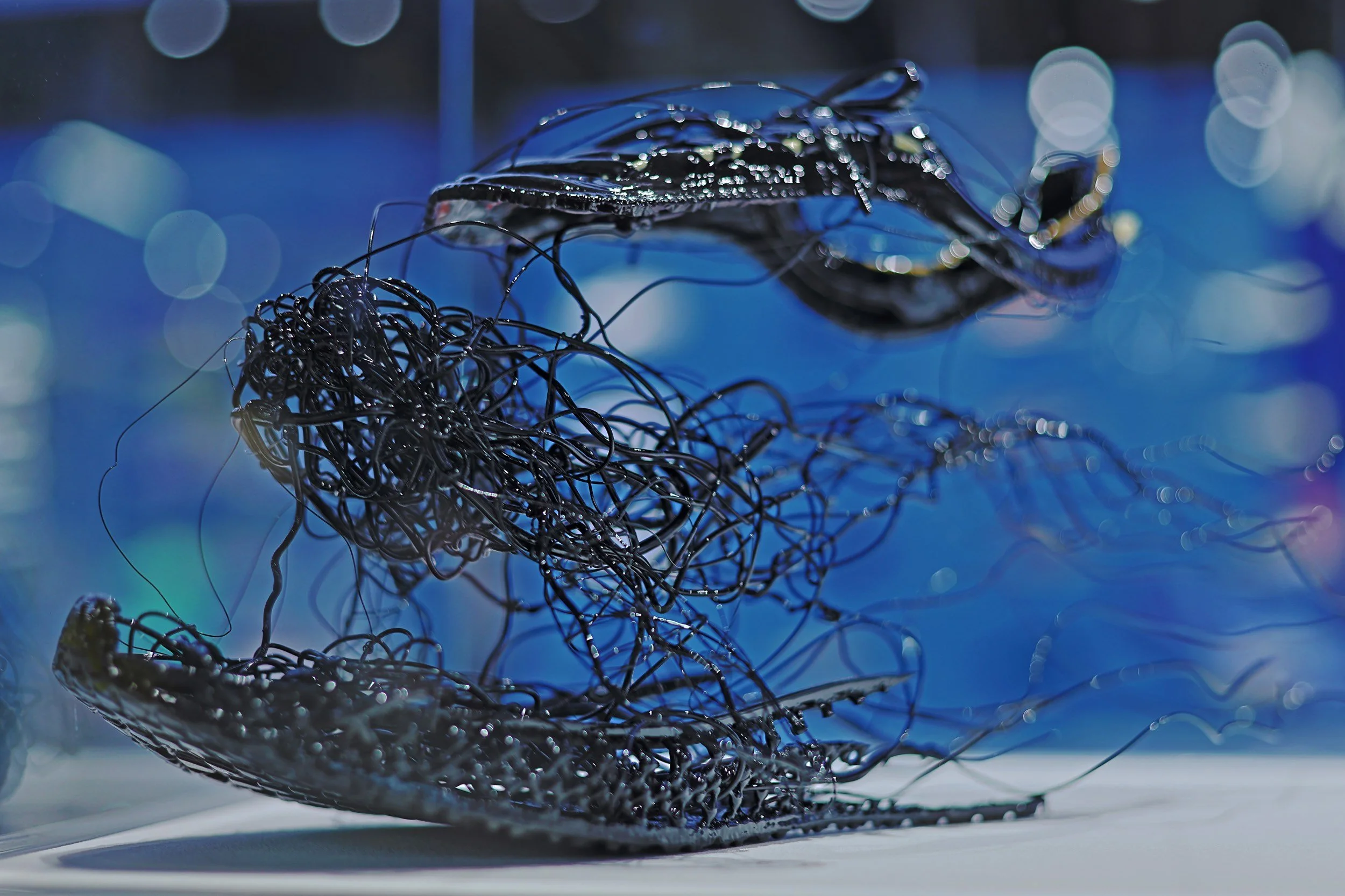 Artist wire footwear sculpture 